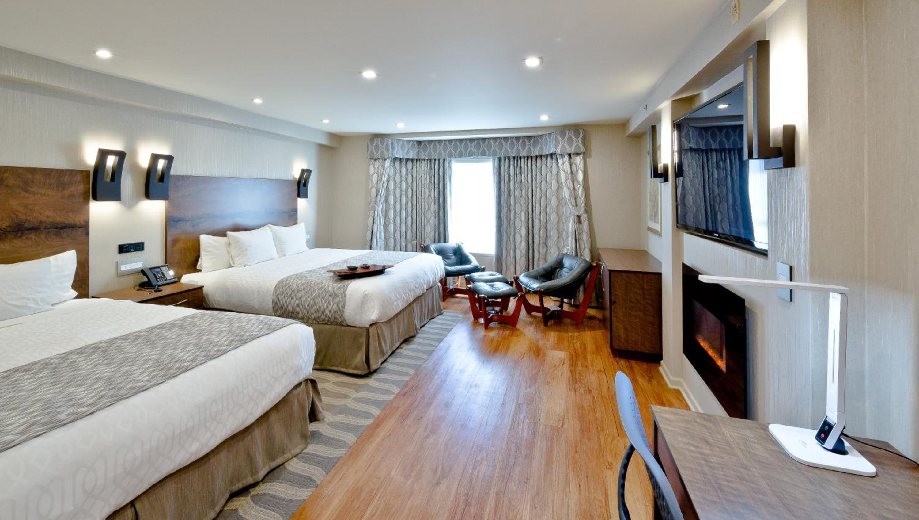 Queen Room with Two Queen Beds - Photo 1