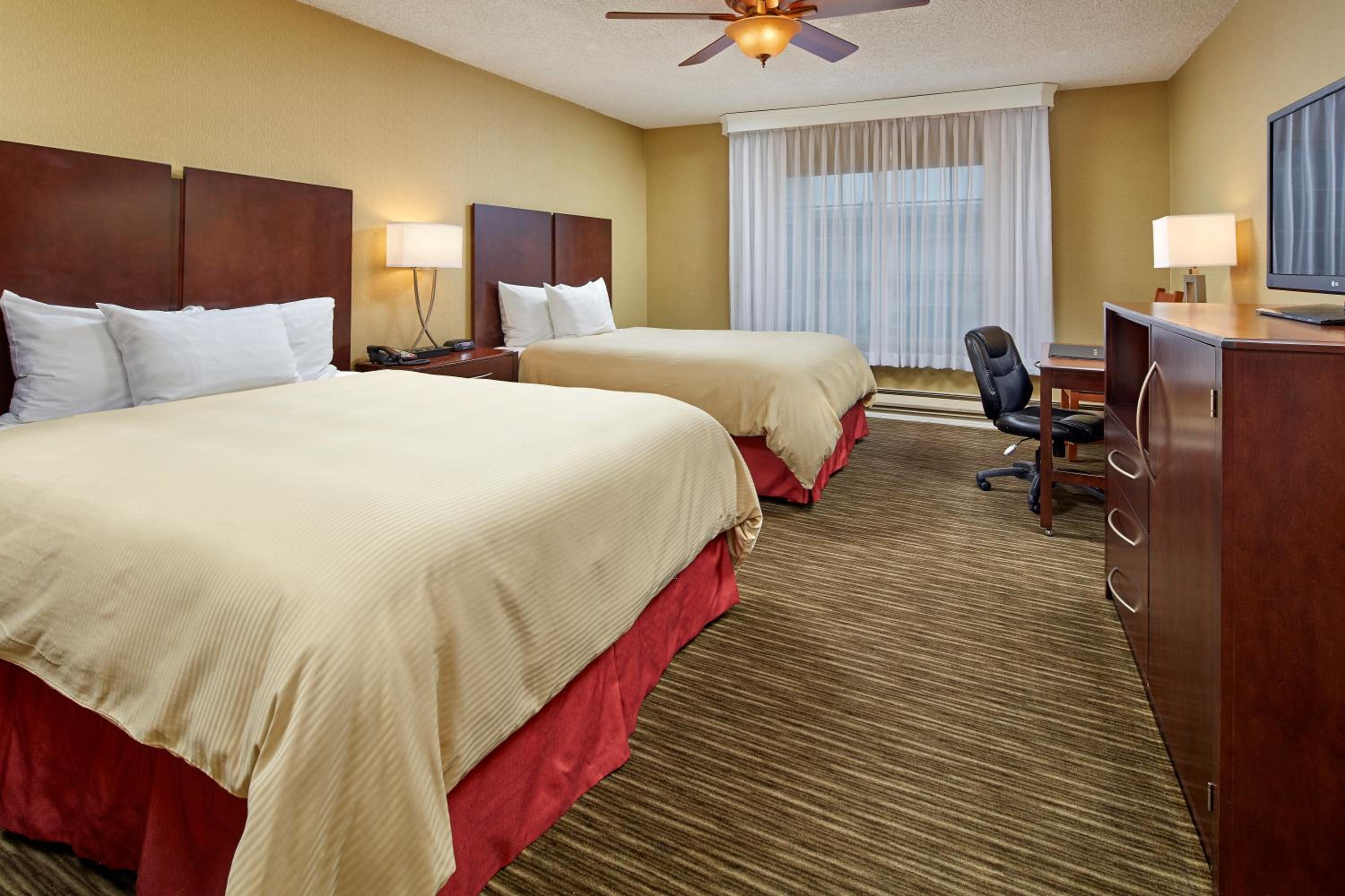 Queen Room with Two Queen Beds - Photo 1