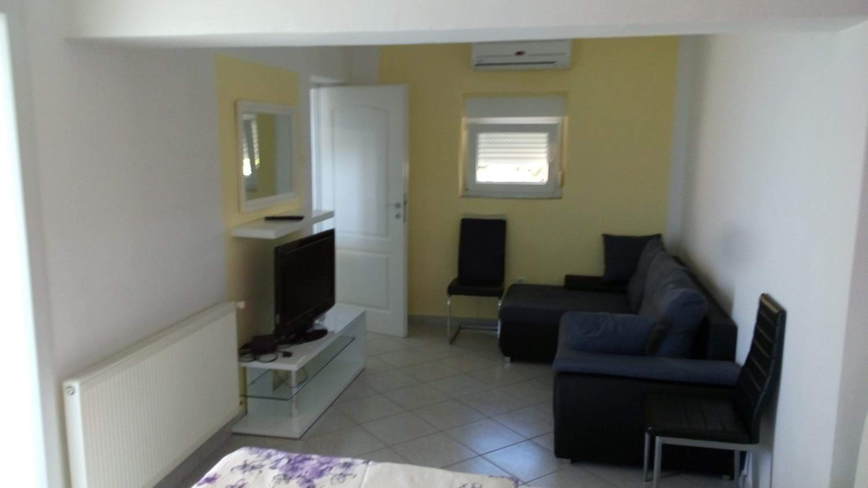 Three-Bedroom Apartment photo 1