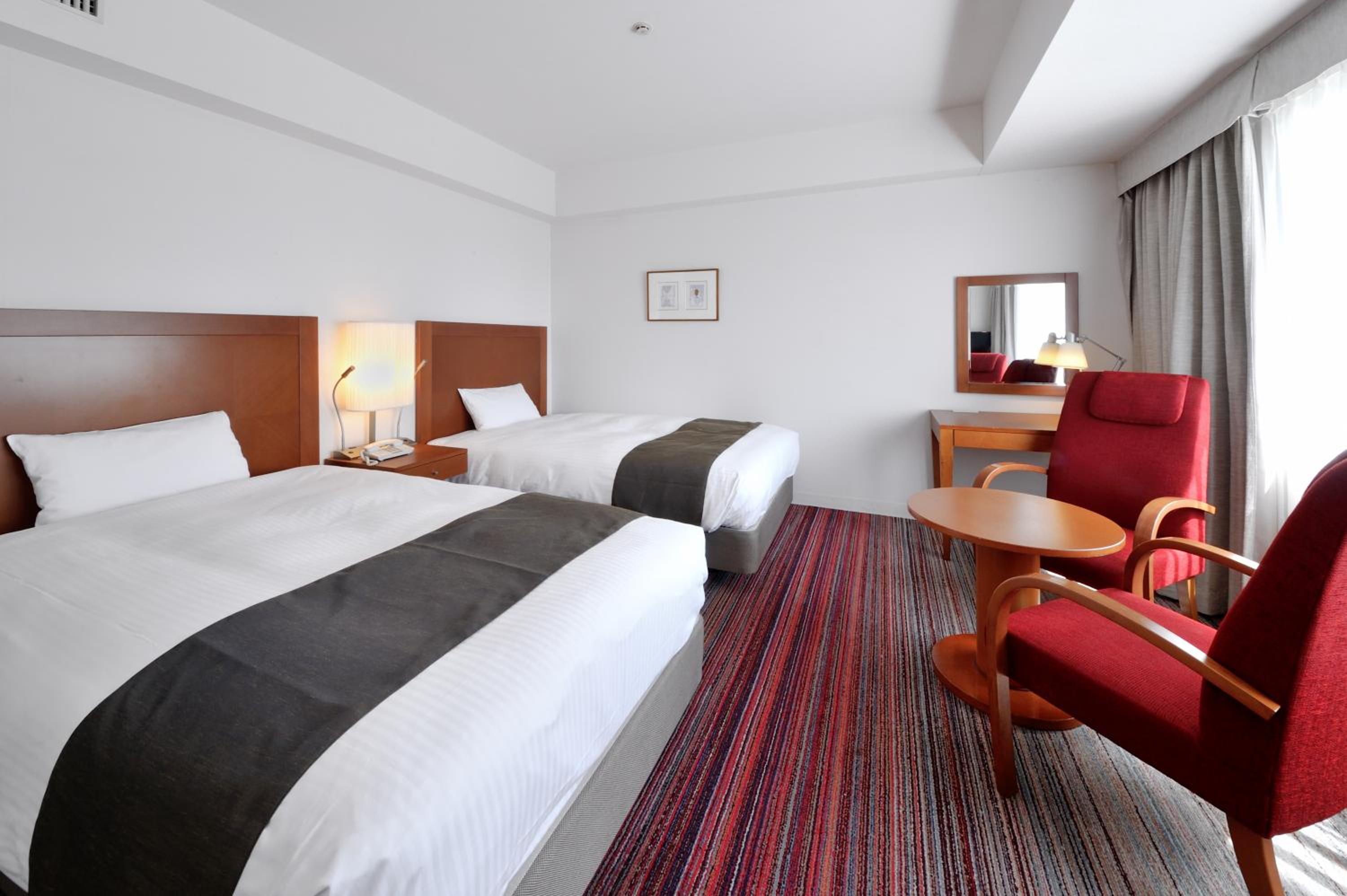 Twin Room (1 Adult) - Non-Smoking photo 1