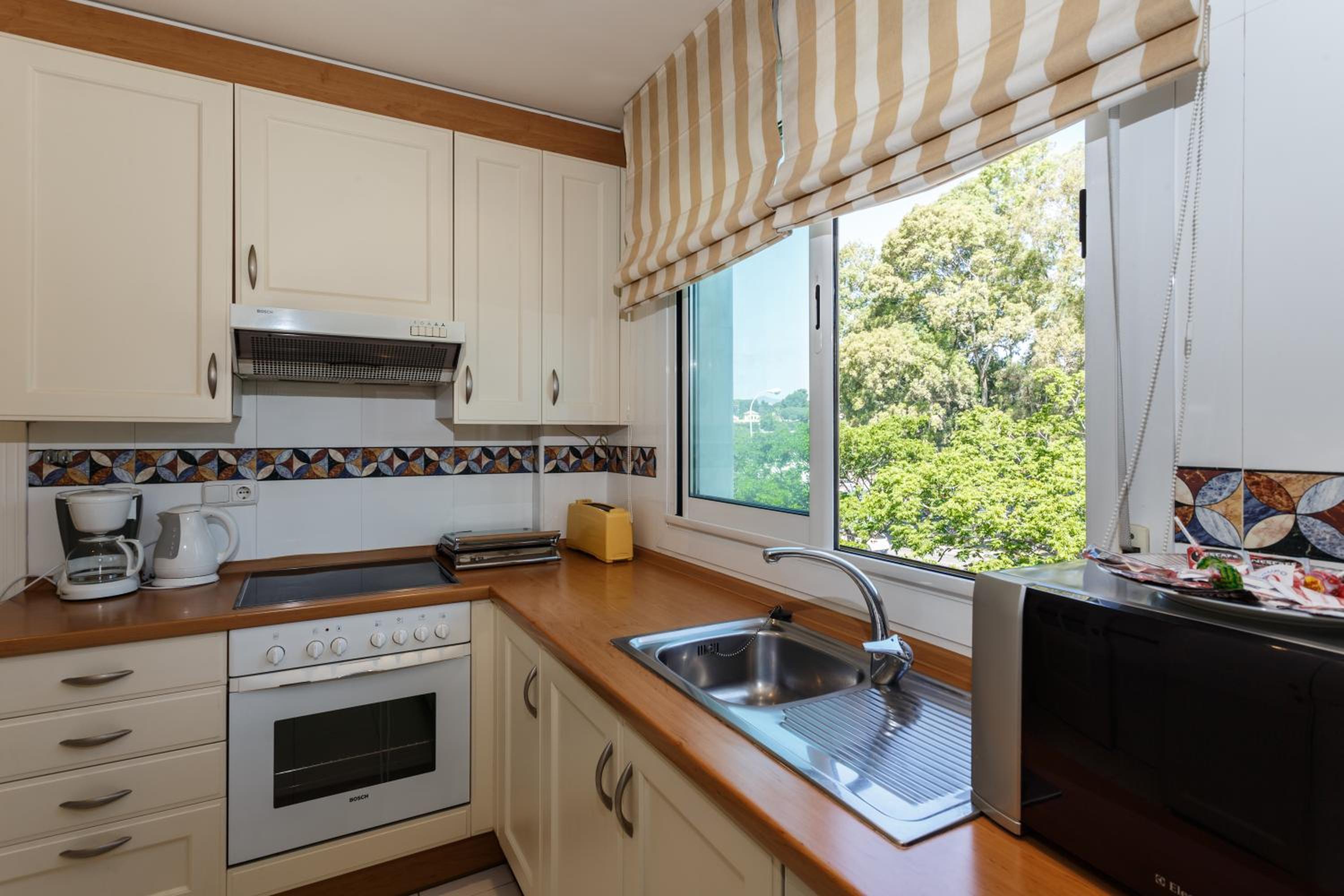 Three-Bedroom Apartment - Photo 9