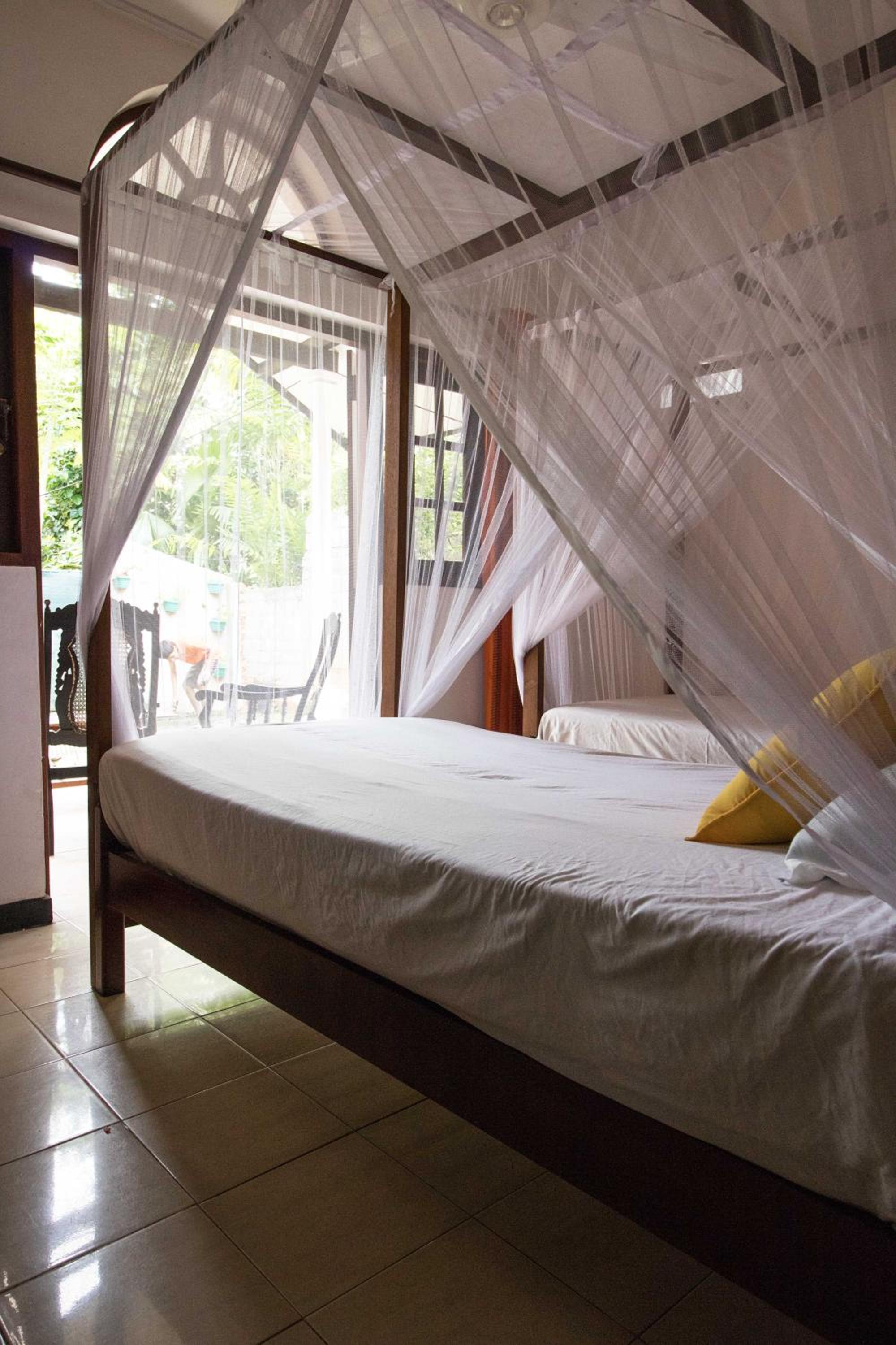 Deluxe Triple Room Private Bathroom & Balcony
