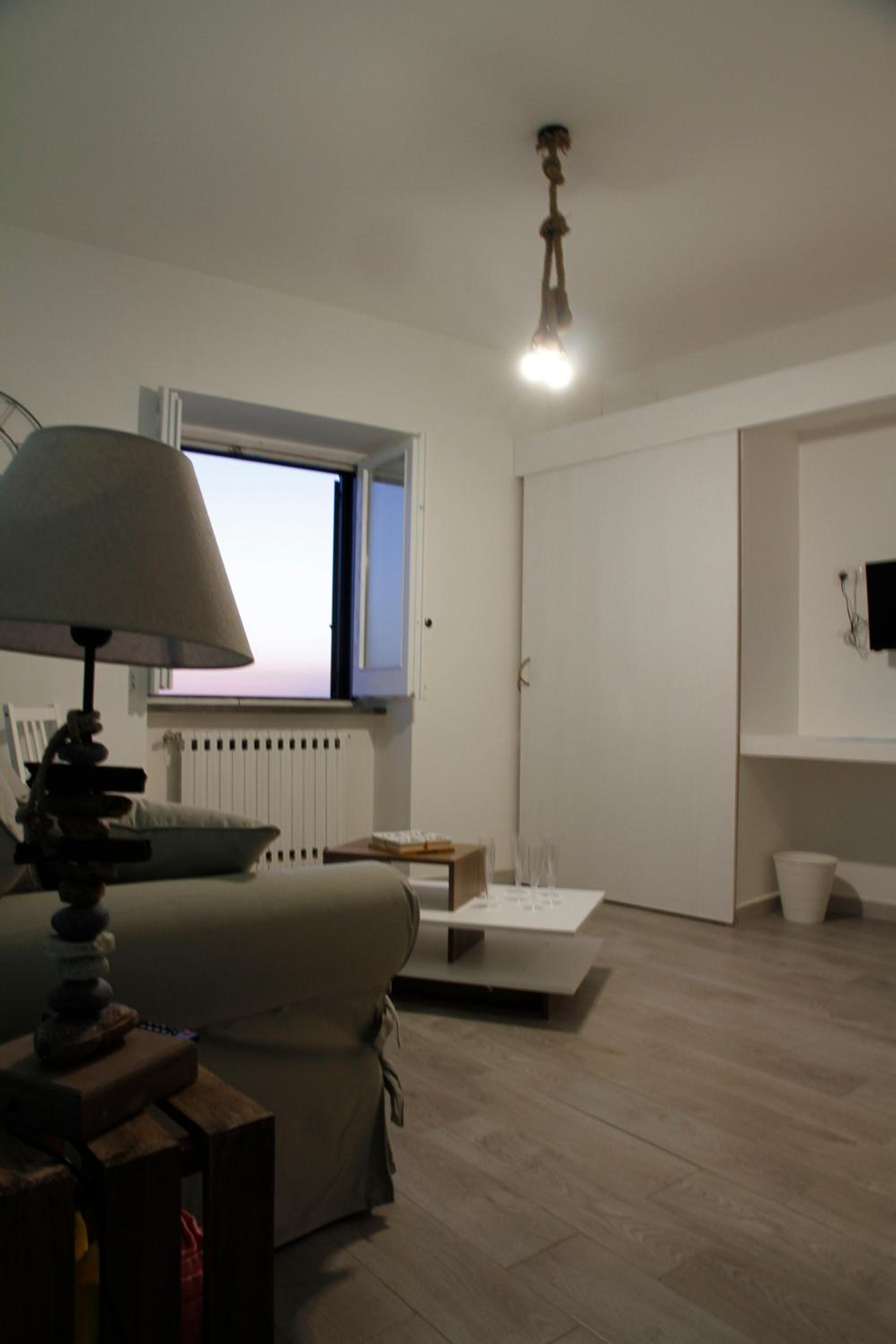 Quadruple Room with Sea View - Photo 16