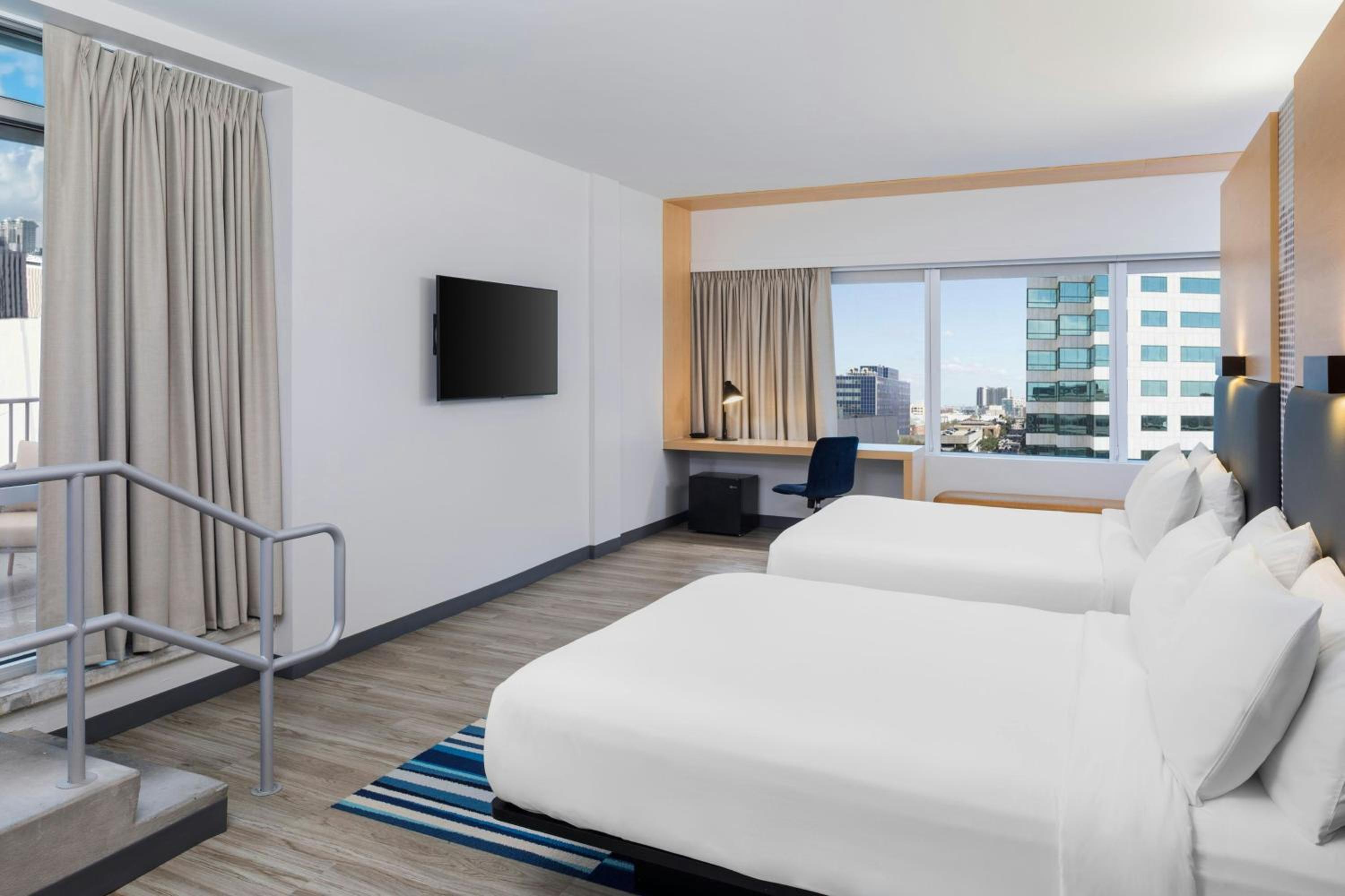 Queen Room with Two Queen Beds and Balcony