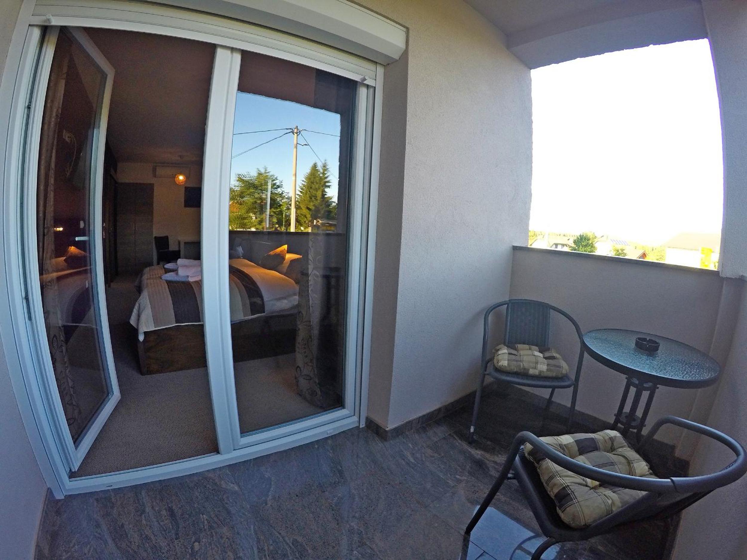 Deluxe Double Room with Balcony - Photo 15
