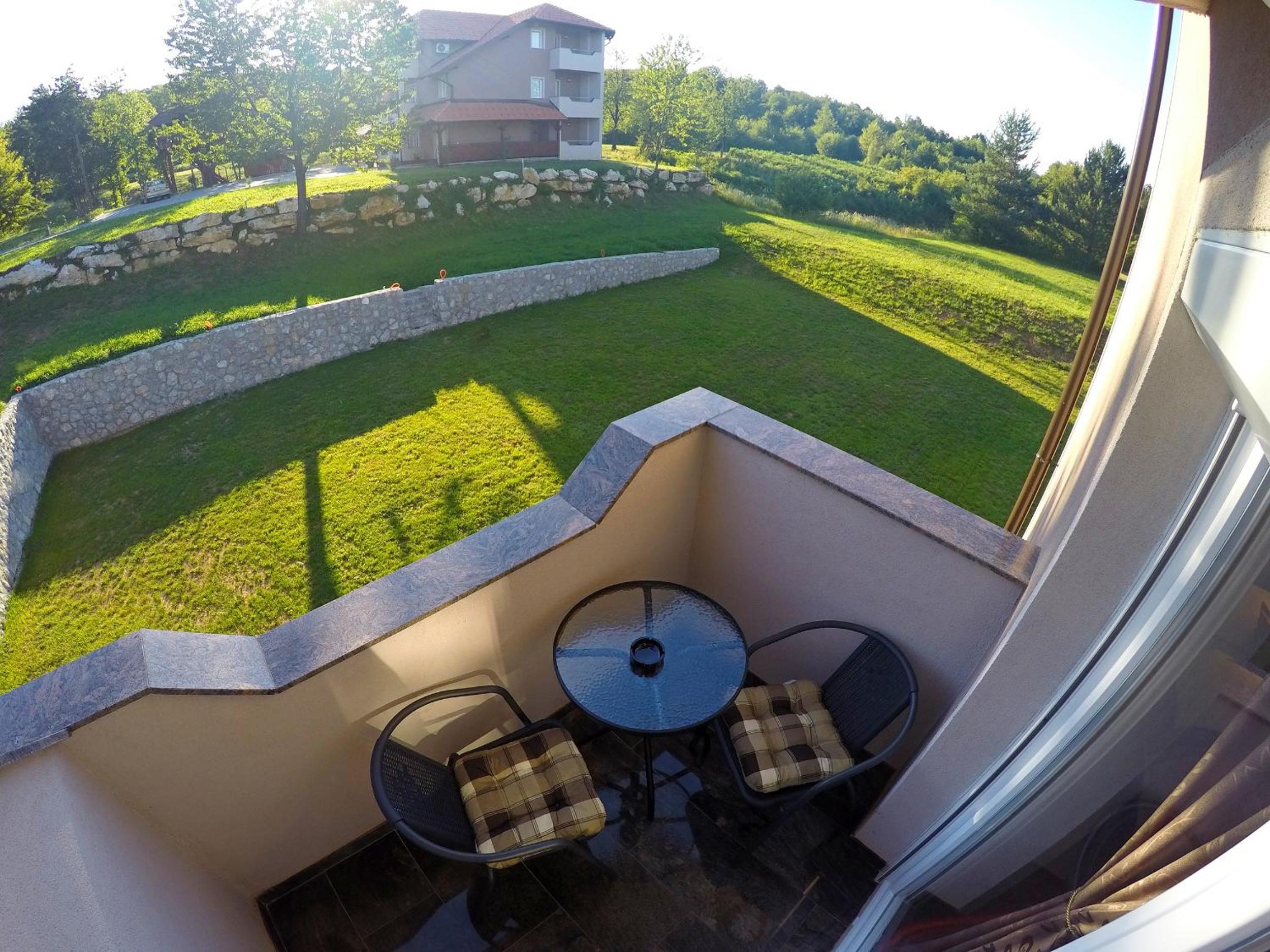 Deluxe Double Room with Balcony - Photo 12