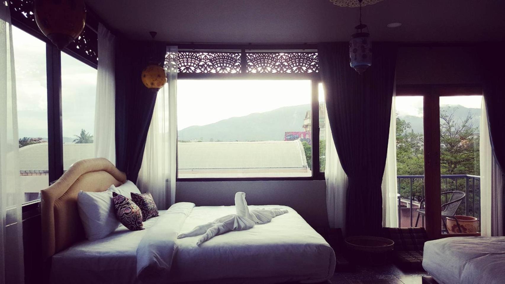 Rooftop Quadruple Room with Balcony - Photo 10