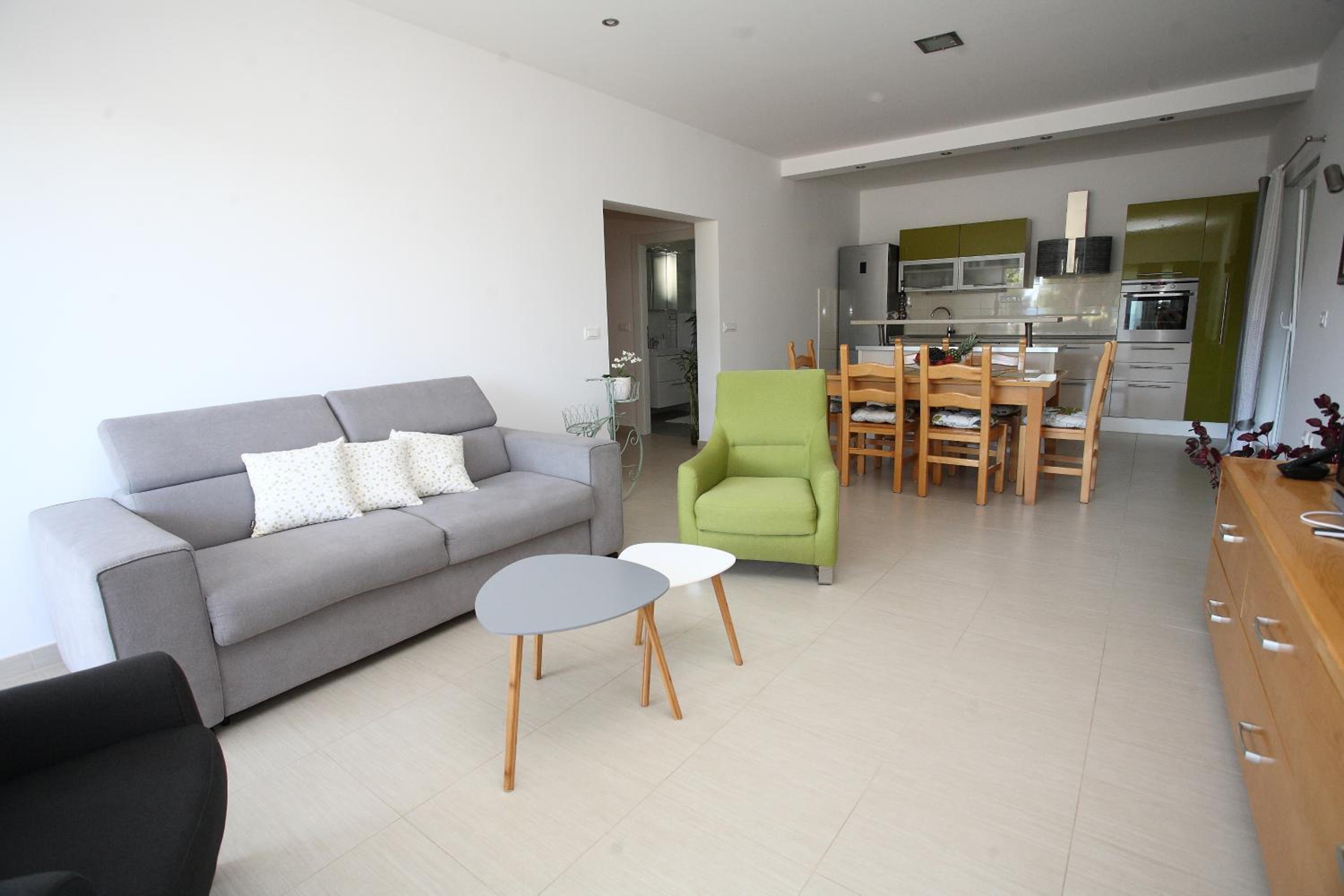 Three-Bedroom Apartment with Balcony and Sea View