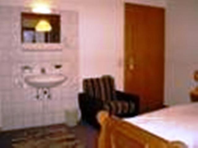 Three-Bedroom Apartment photo 1