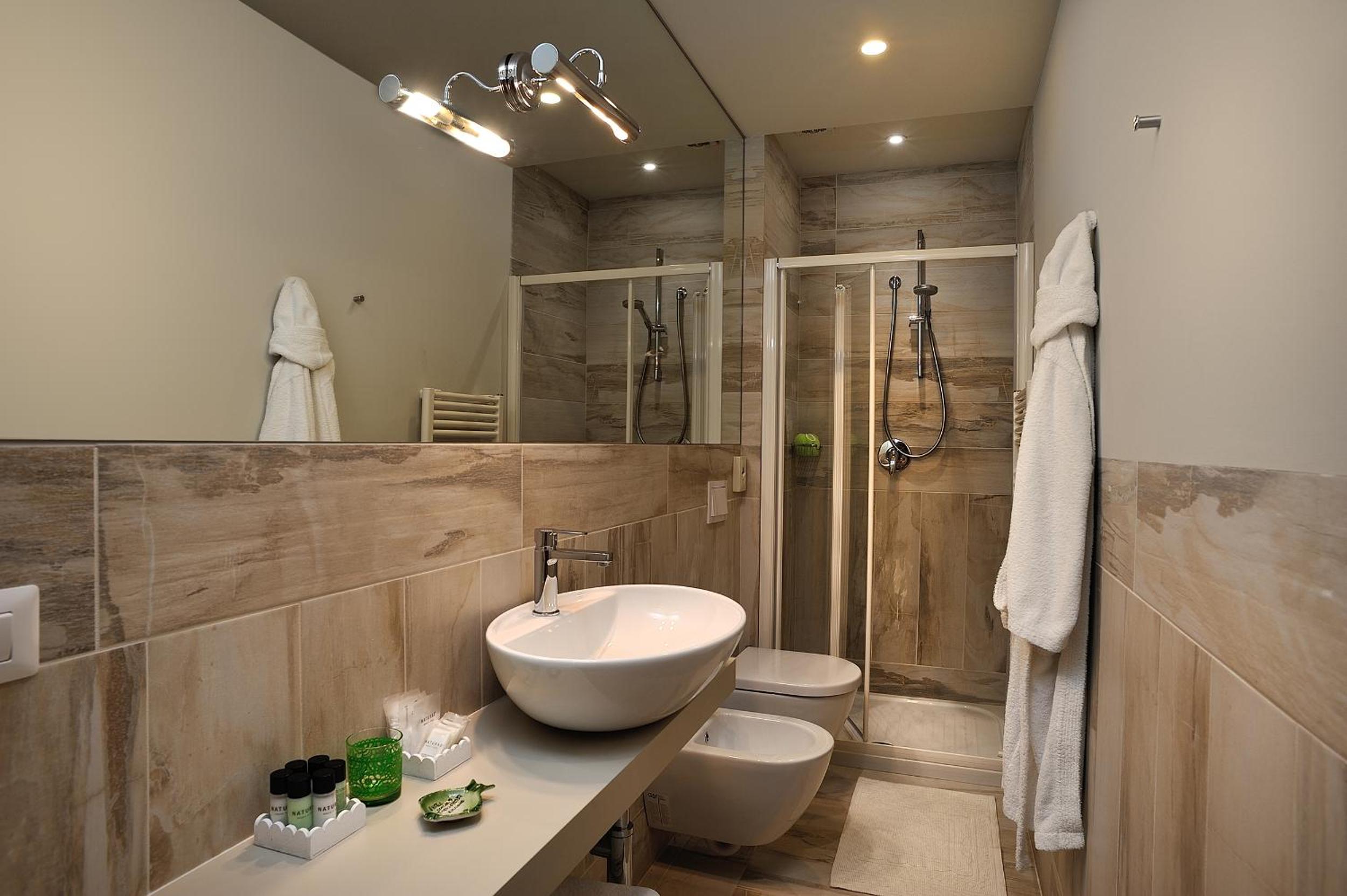 Deluxe Quadruple Room - Photo 7