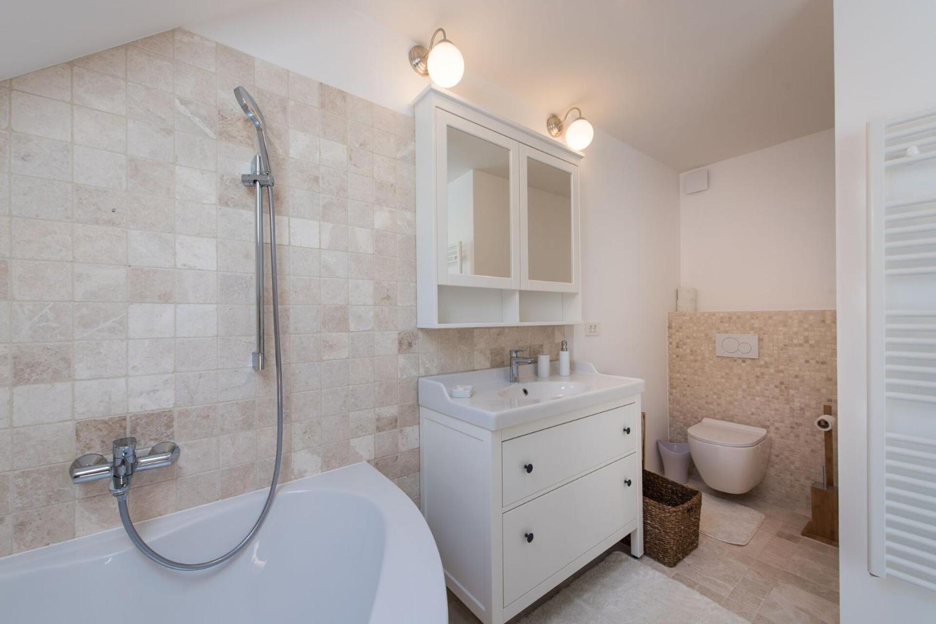 Three-Bedroom Apartment - Photo 16