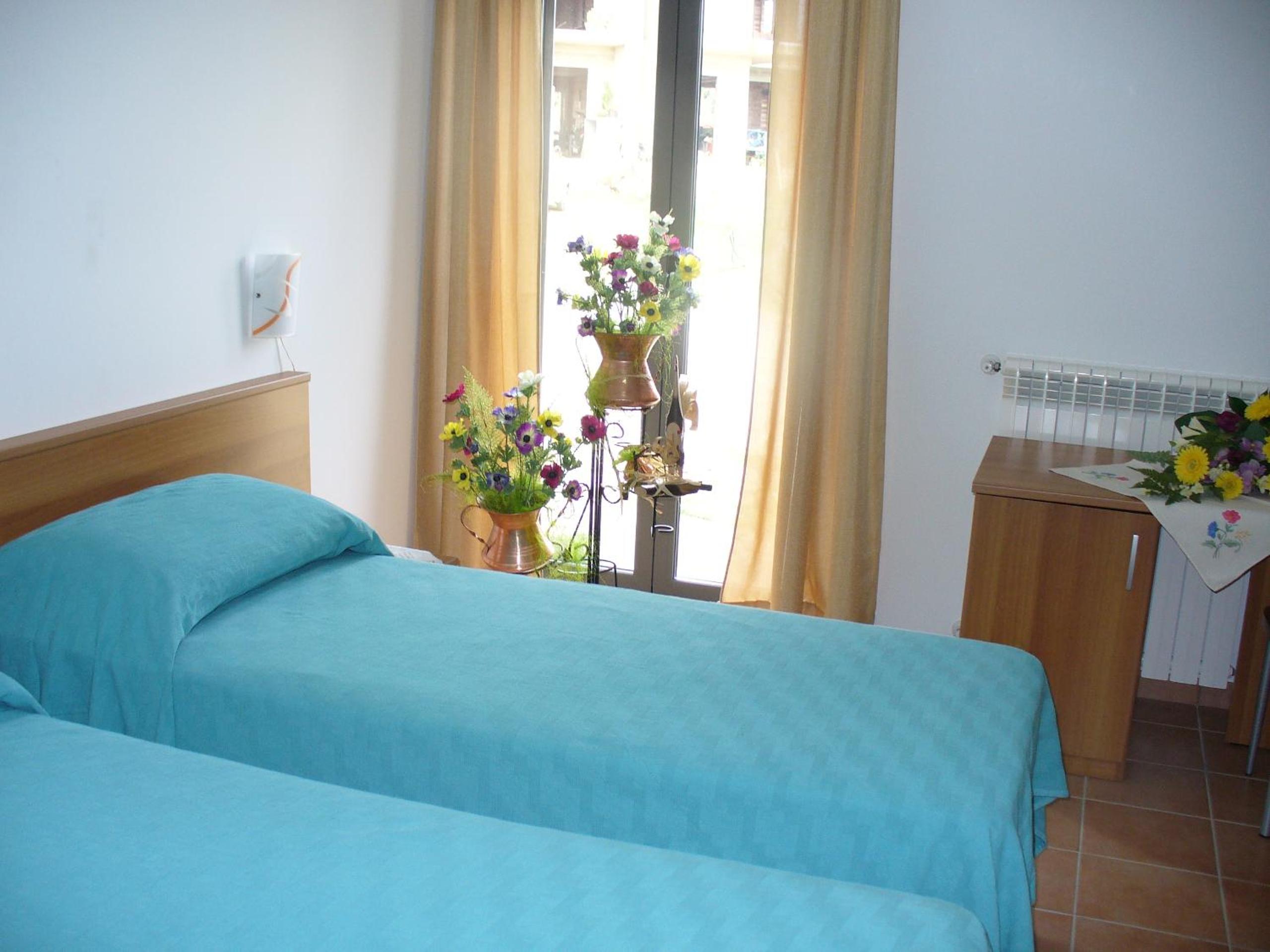 Quadruple Room with Private Bathroom