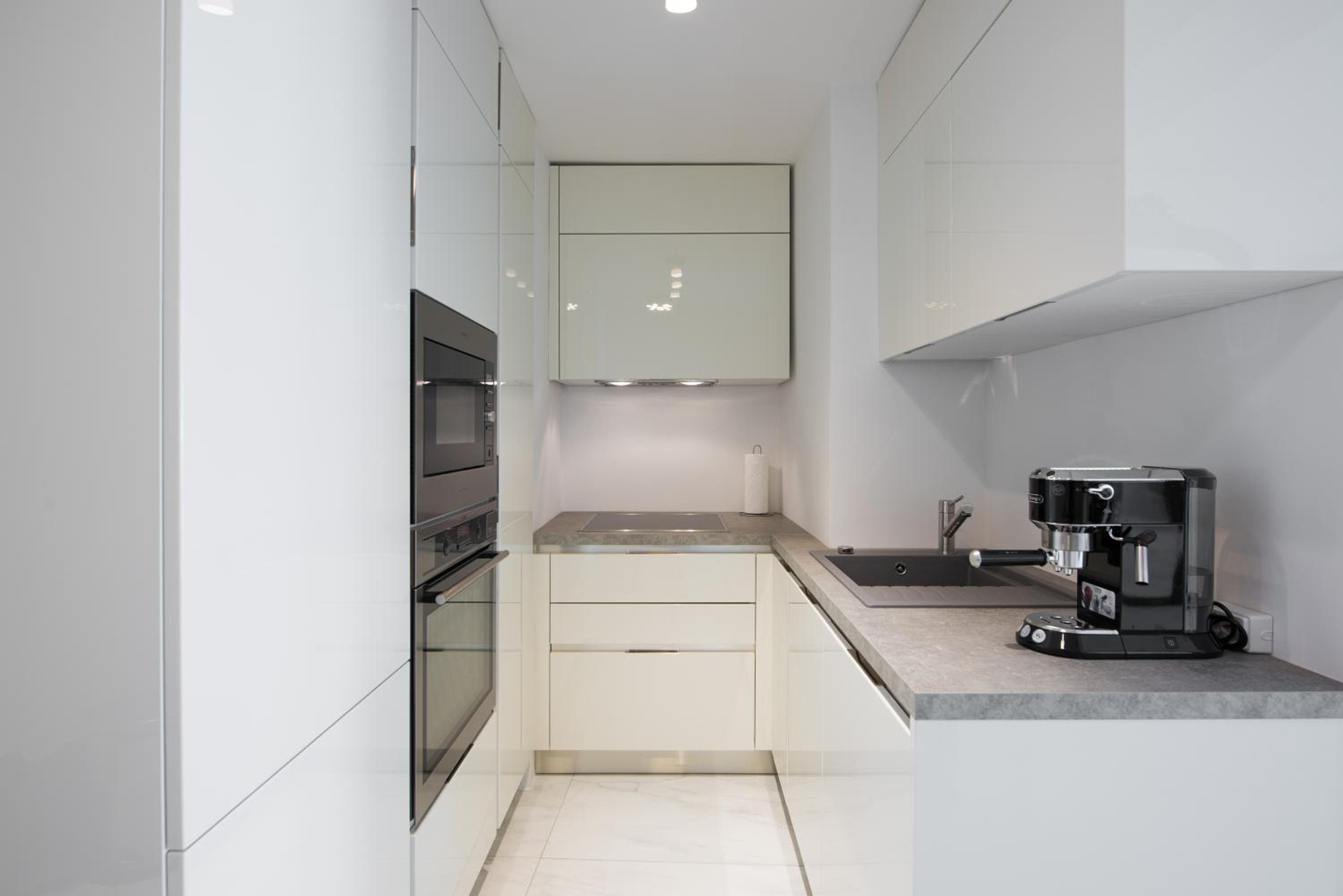 Three-Bedroom Apartment - Photo 28