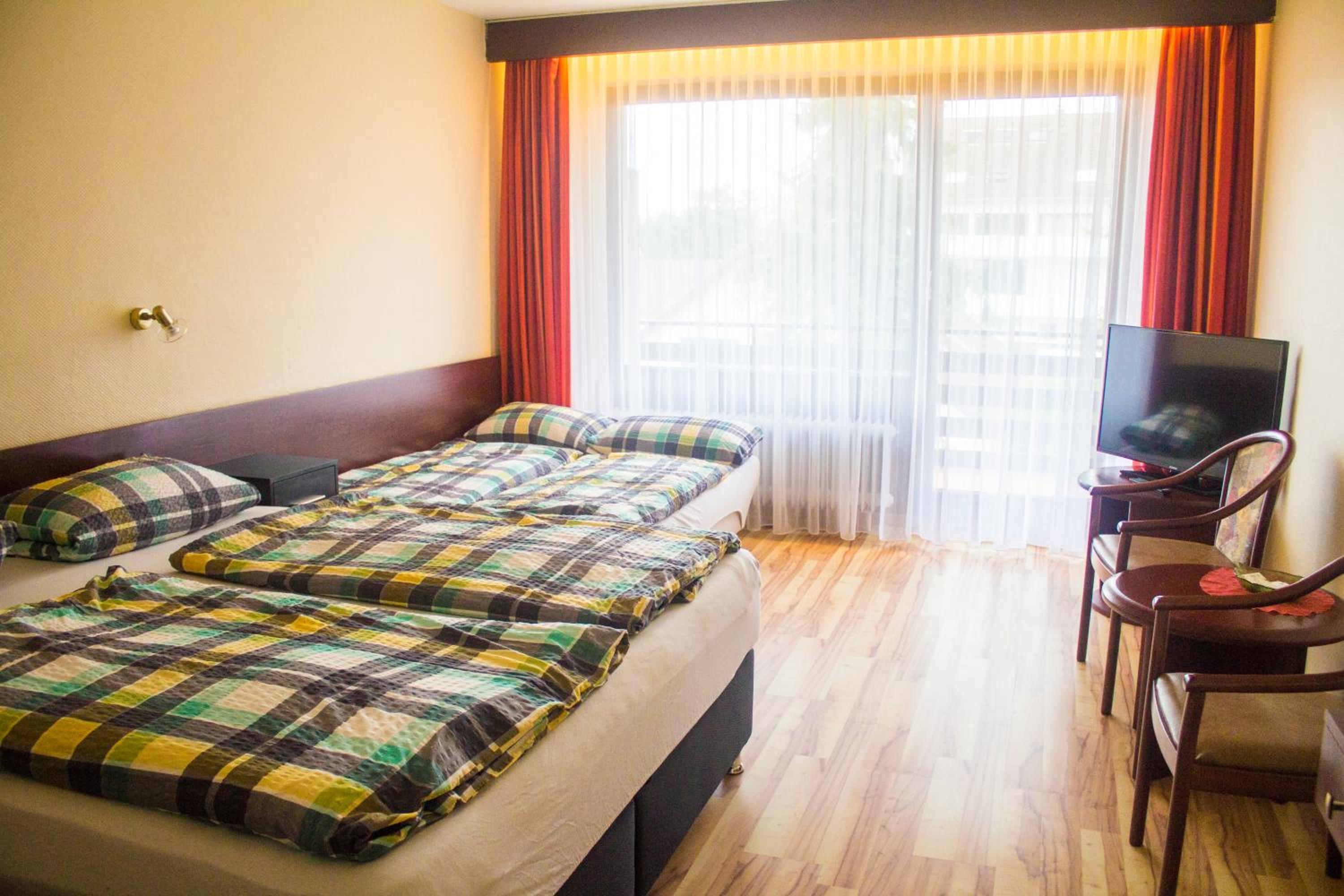 Family Room (2 Adults + 2 Children) with Balcony