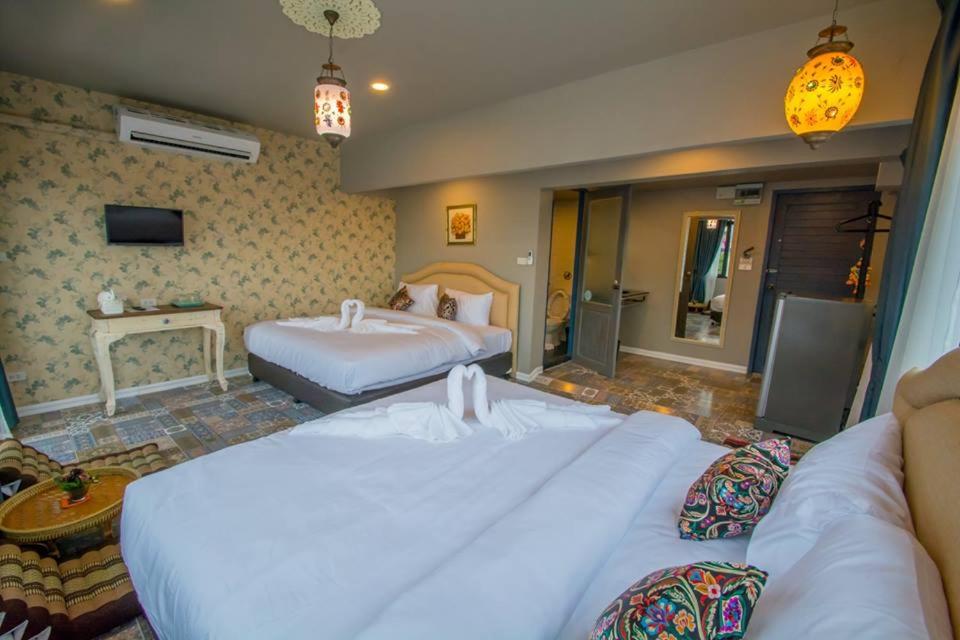 Rooftop Quadruple Room with Balcony - Photo 1