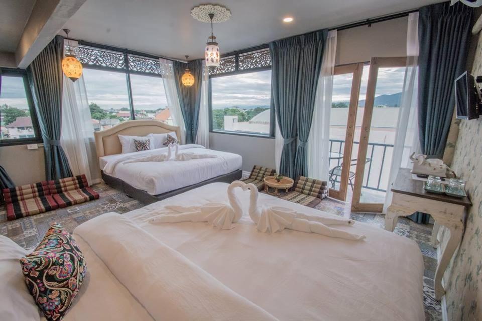 Rooftop Quadruple Room with Balcony - Photo 4