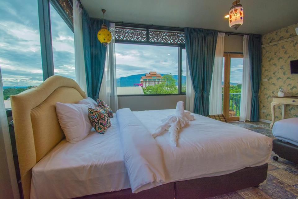 Rooftop Quadruple Room with Balcony - Photo 16