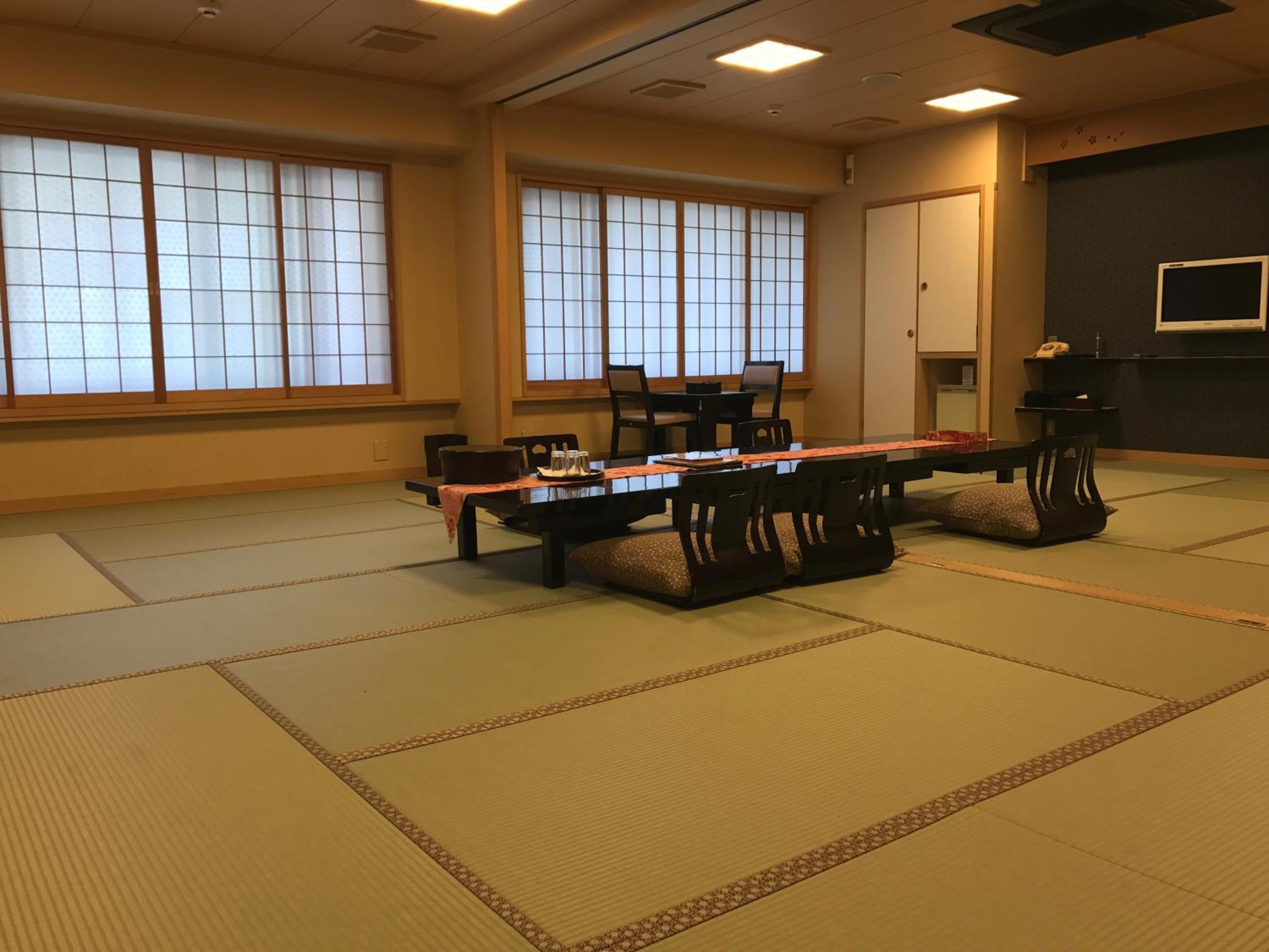 Japanese-Style Family Room with Shared Bathroom