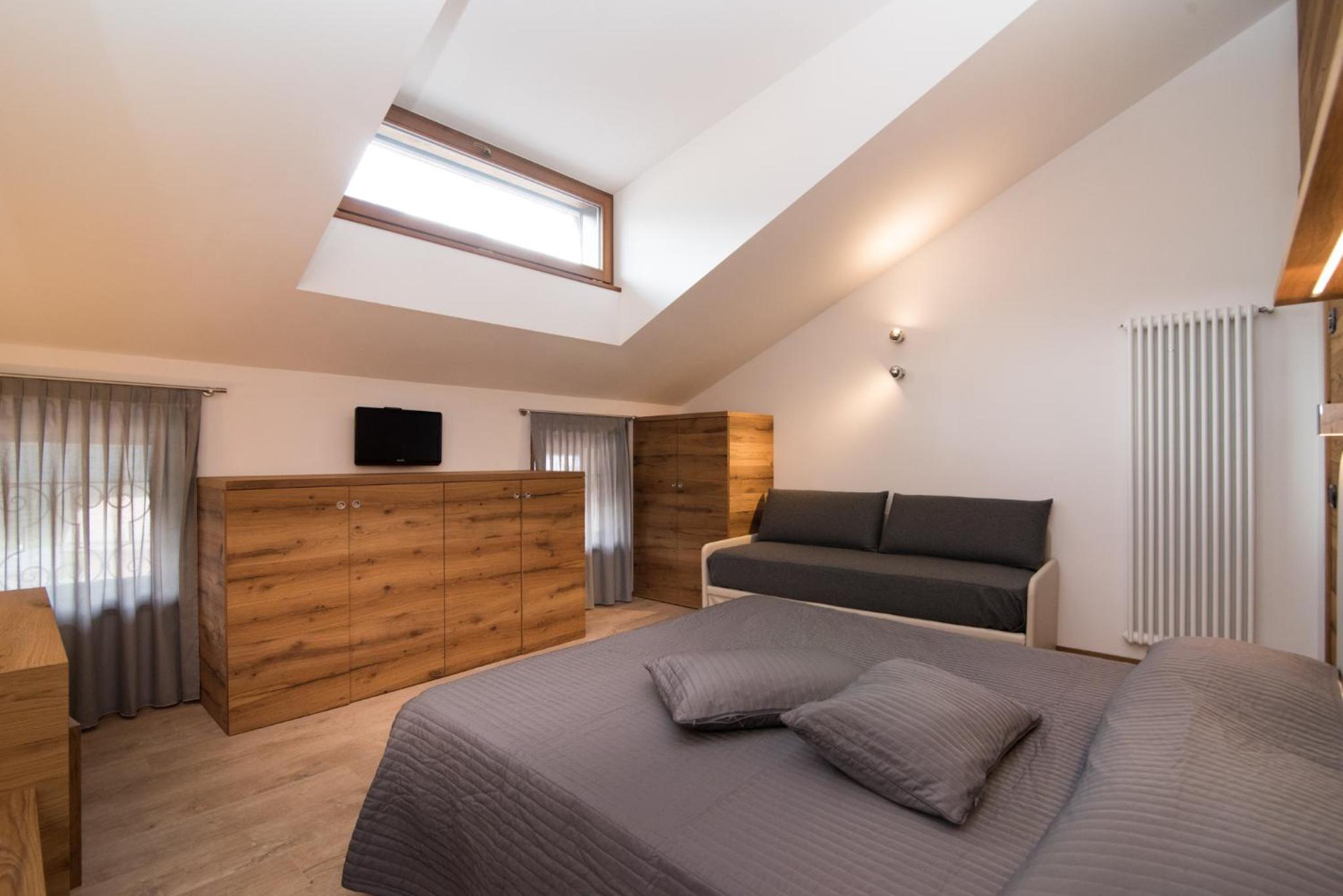 Deluxe Triple Room - Photo 12