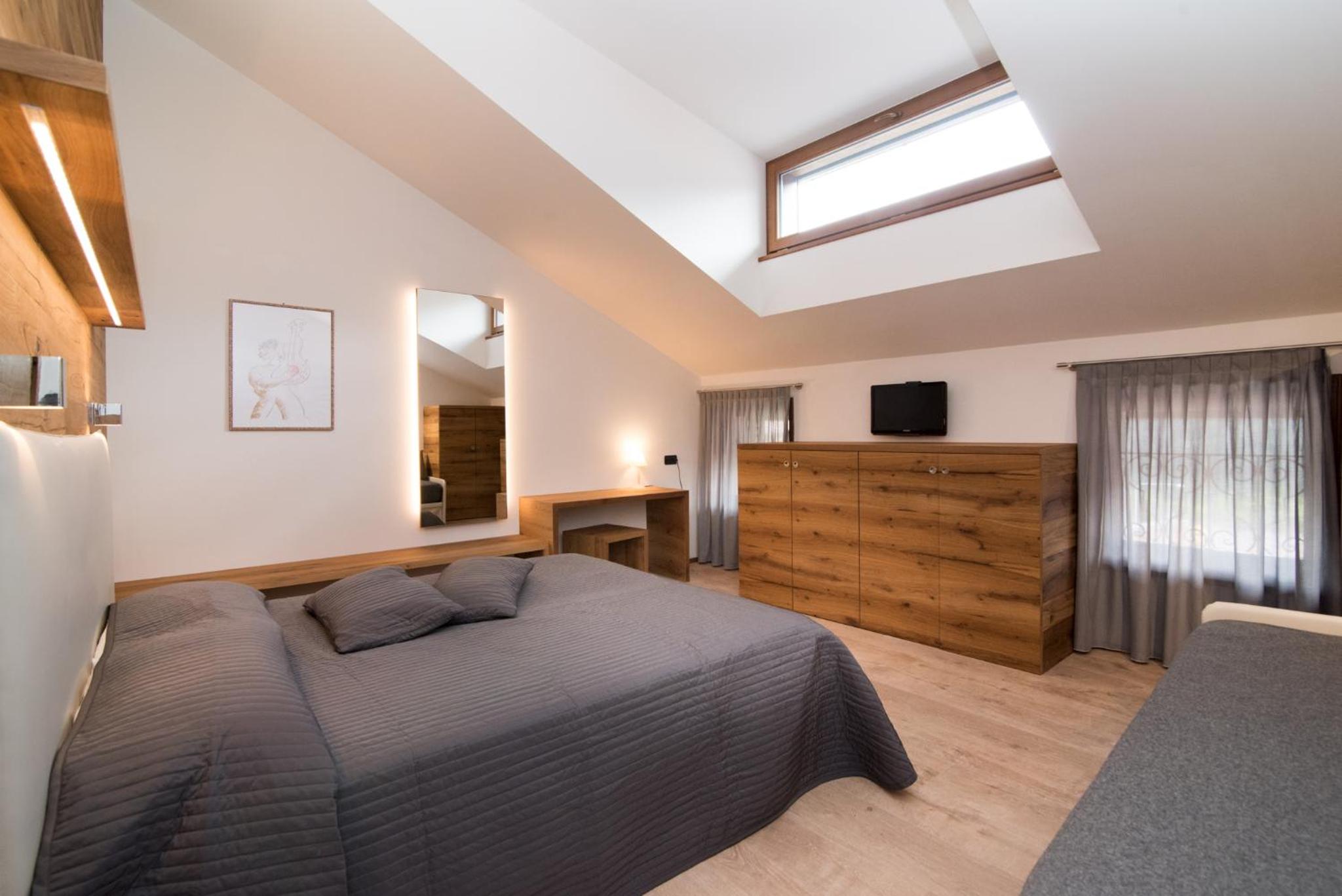 Deluxe Triple Room - Photo 10