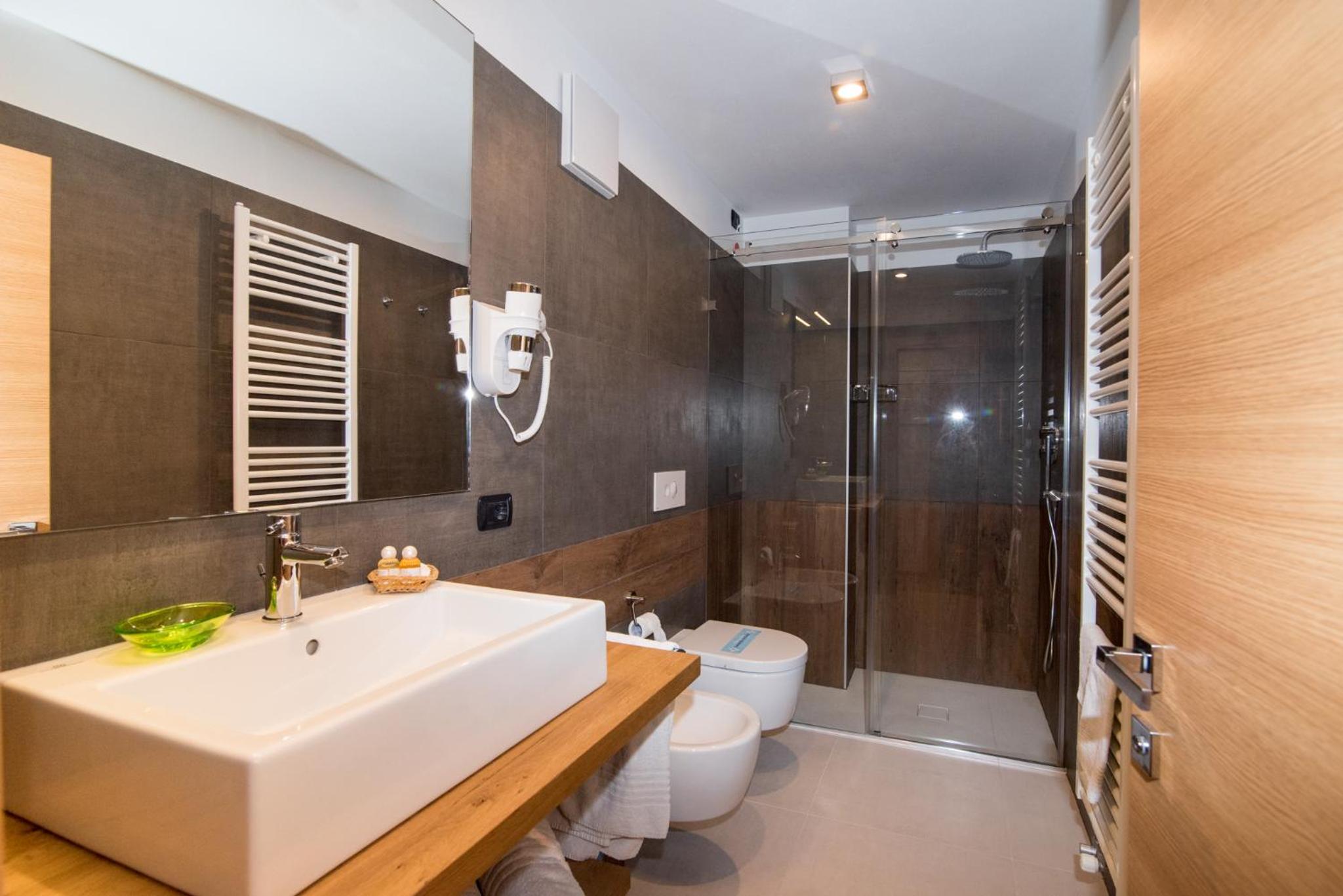 Deluxe Triple Room - Photo 9