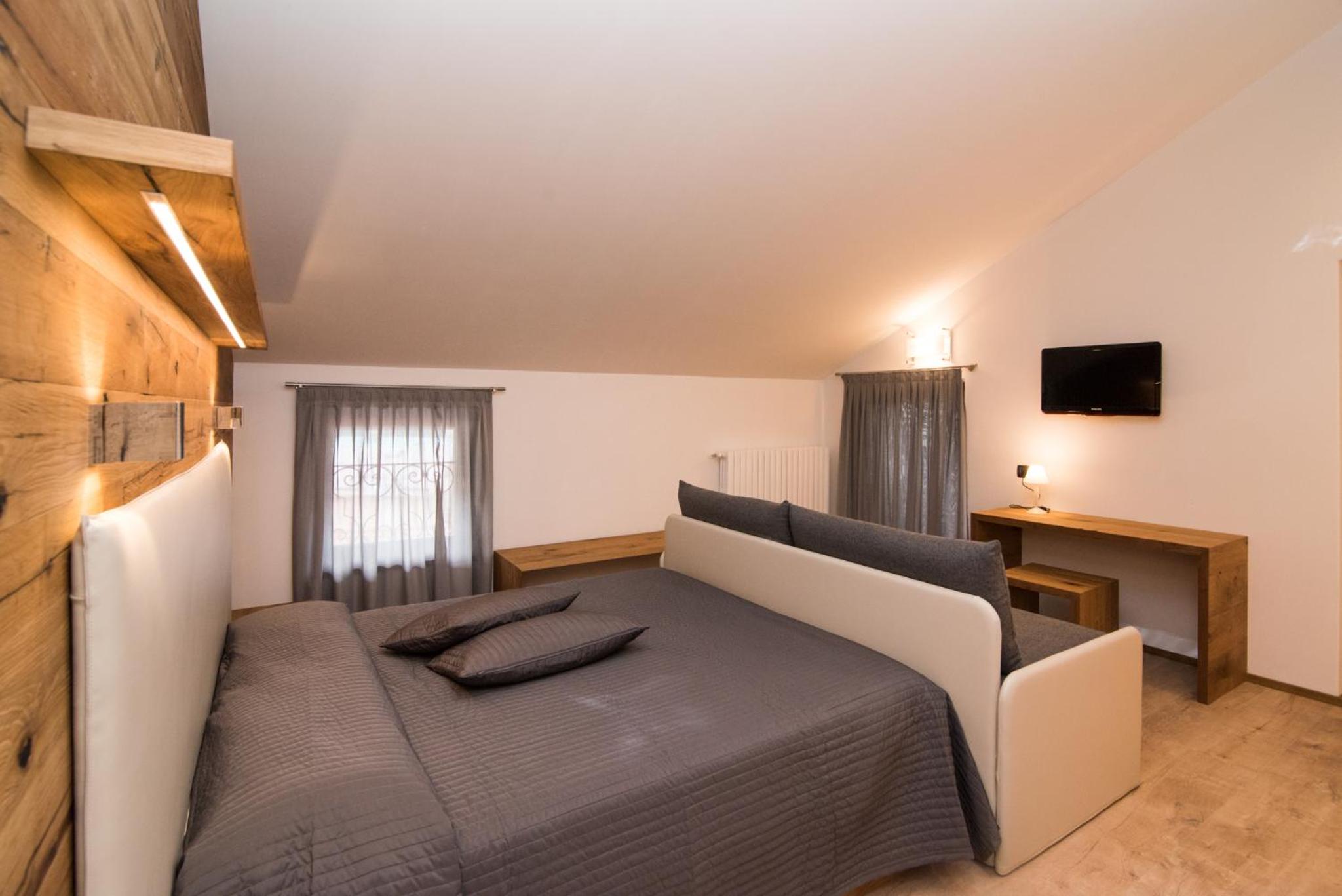 Deluxe Triple Room - Photo 7