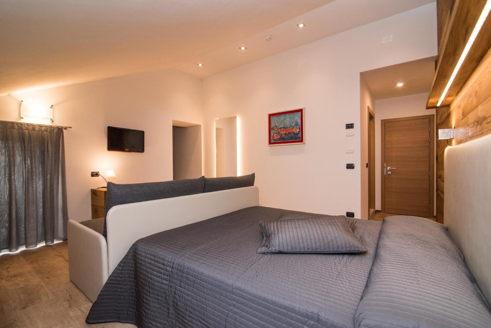 Deluxe Triple Room - Photo 8