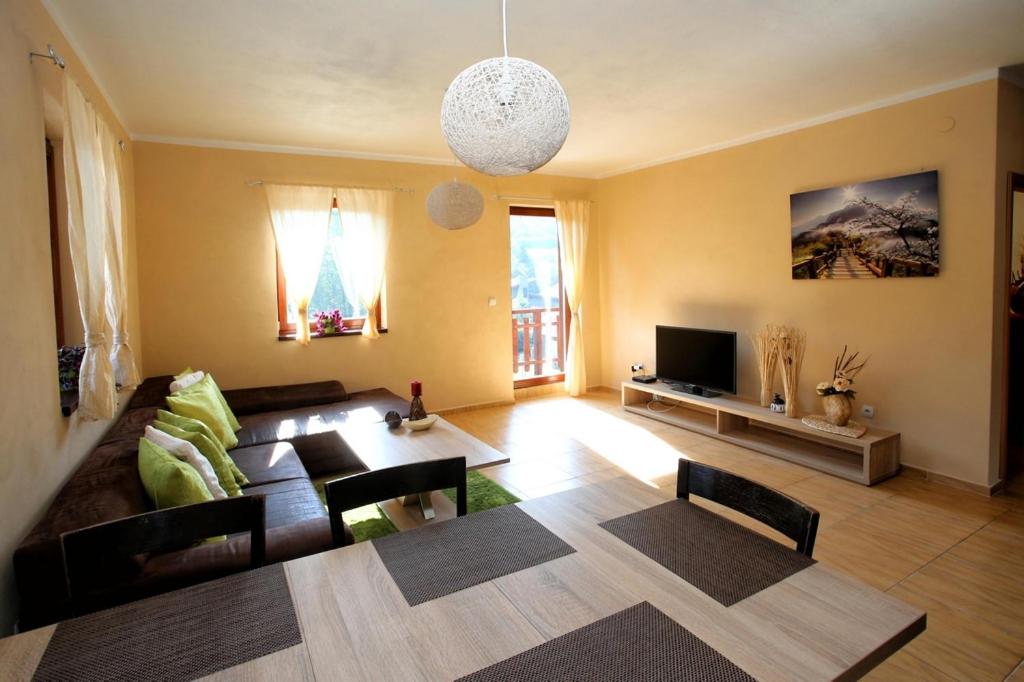 Three-Bedroom Apartment photo 1