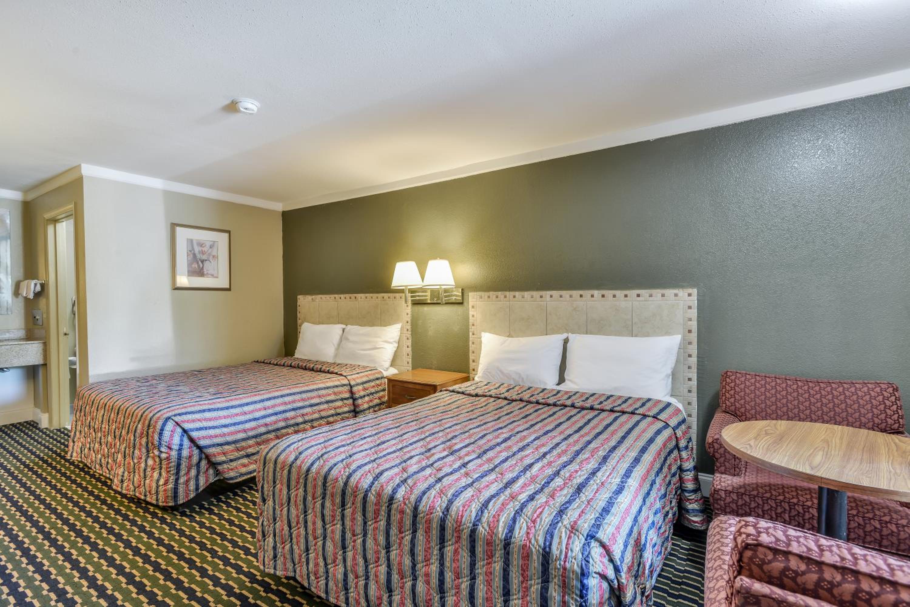 Queen Room with Two Queen Beds - Photo 1