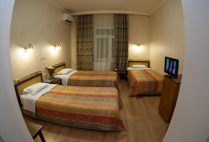 Triple Room - Photo 1