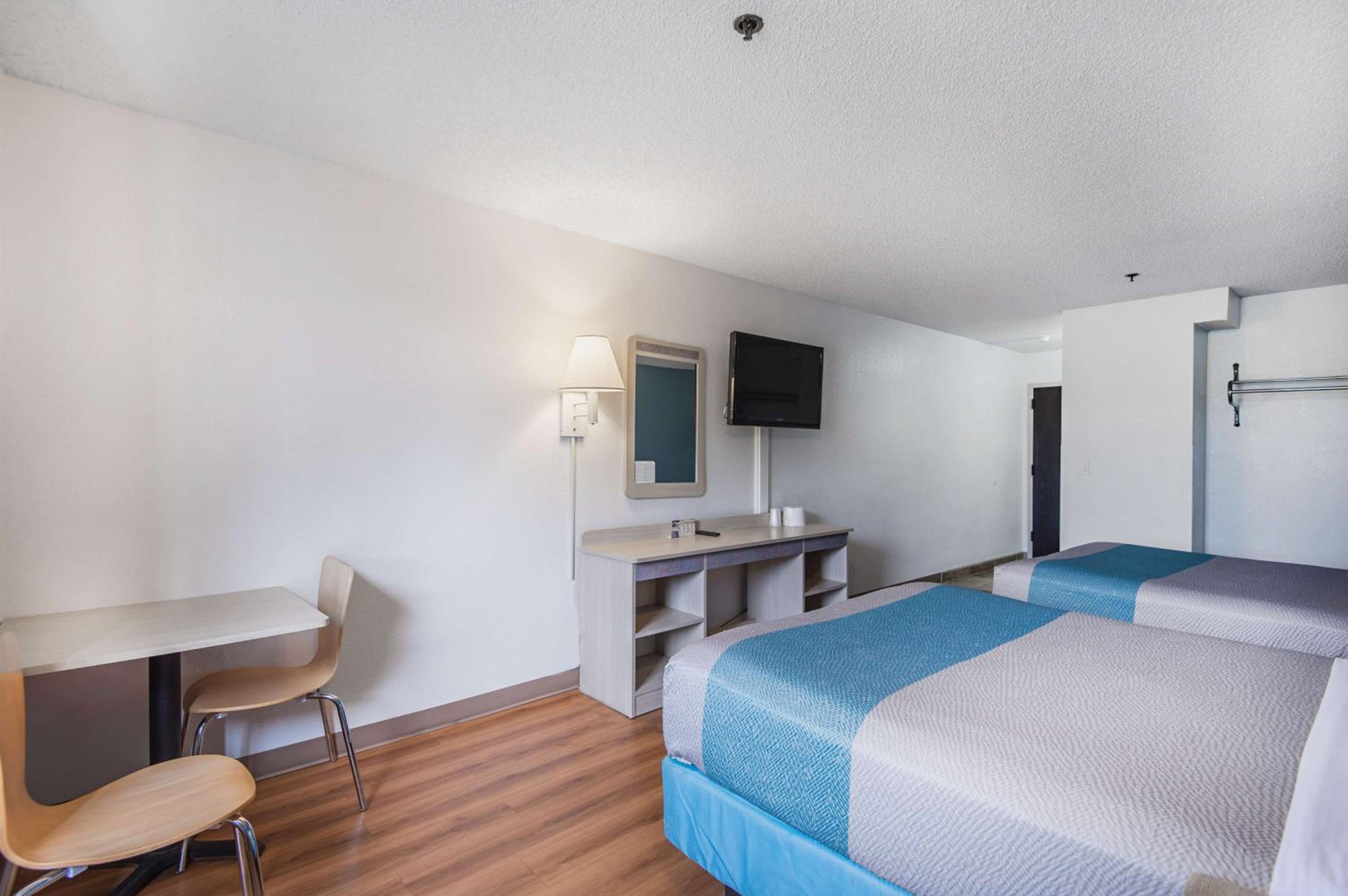 Deluxe Queen Room with Two Queen Beds - Non-Smoking photo 1