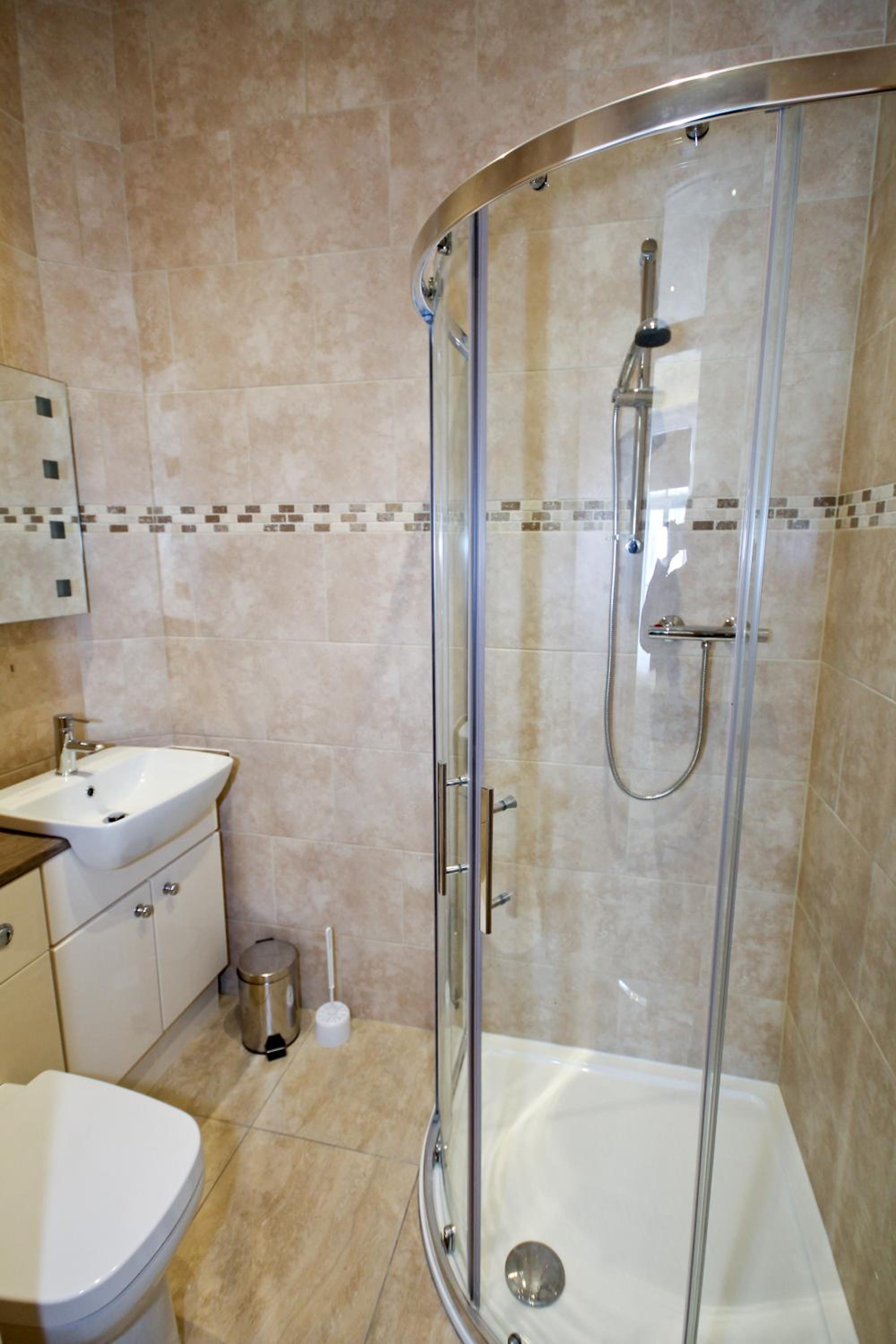 Three-Bedroom Apartment - Photo 26