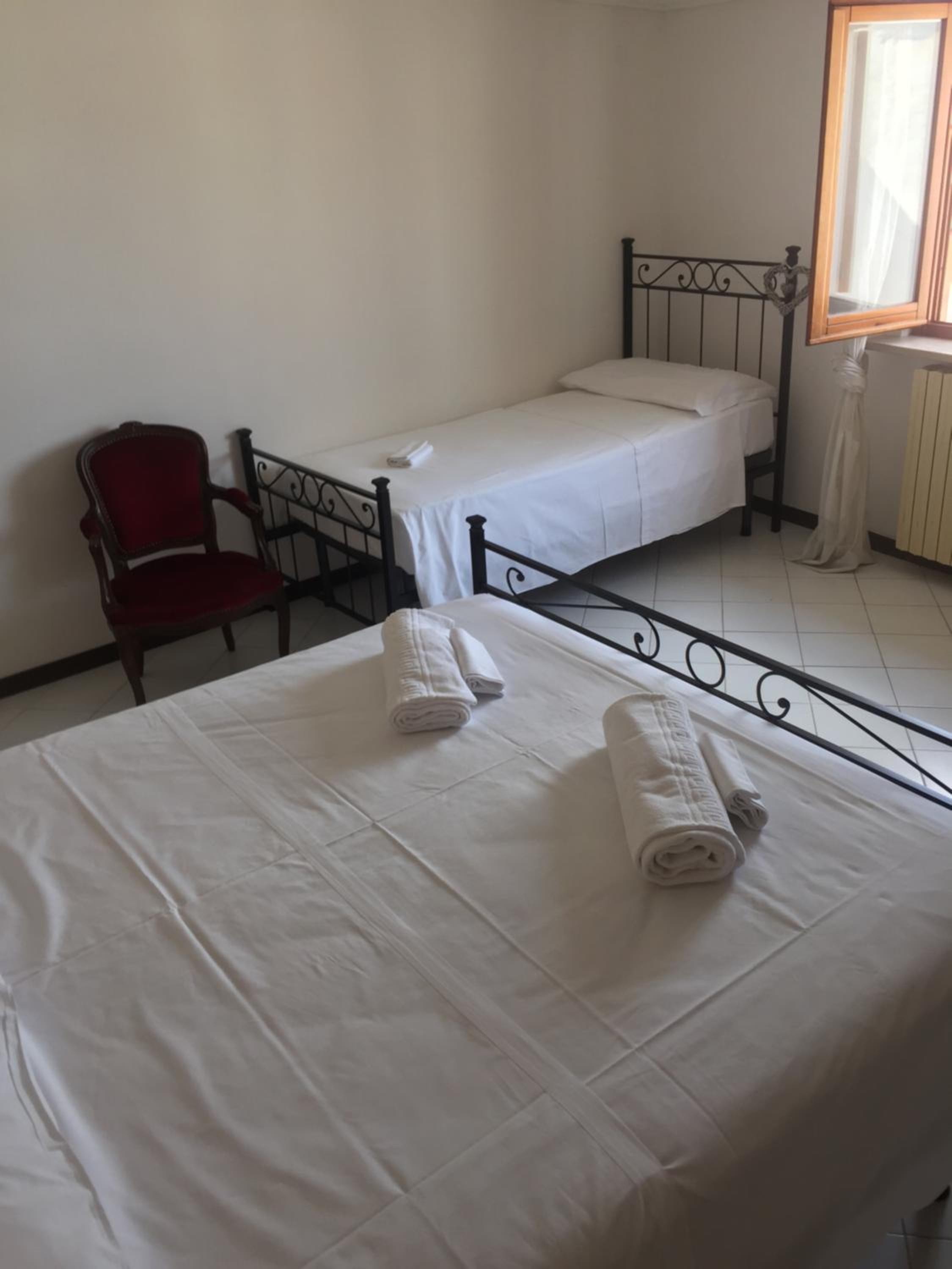 Quadruple Room with Private Bathroom - Photo 1