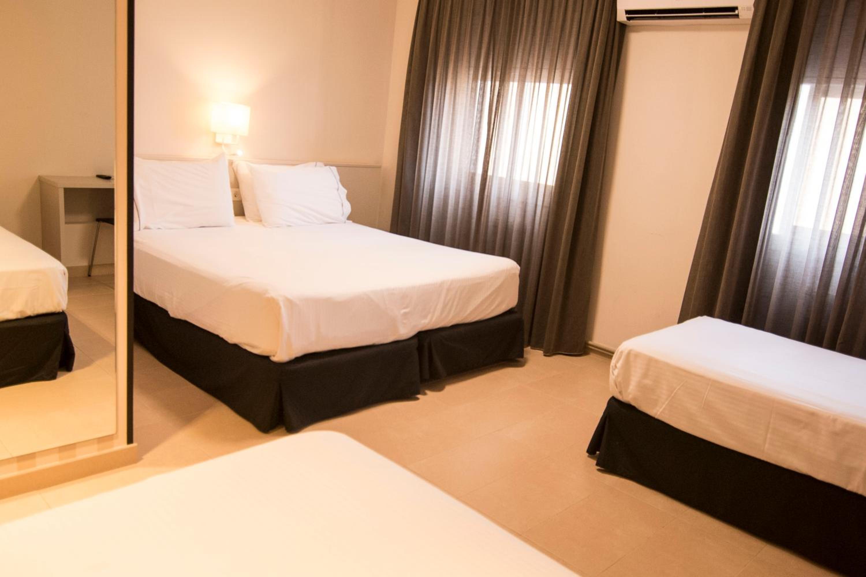 Habitación Familiar (2 Adultos + 2 Niños)
