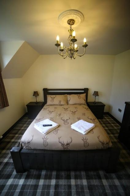 Deluxe King Room - Photo 7