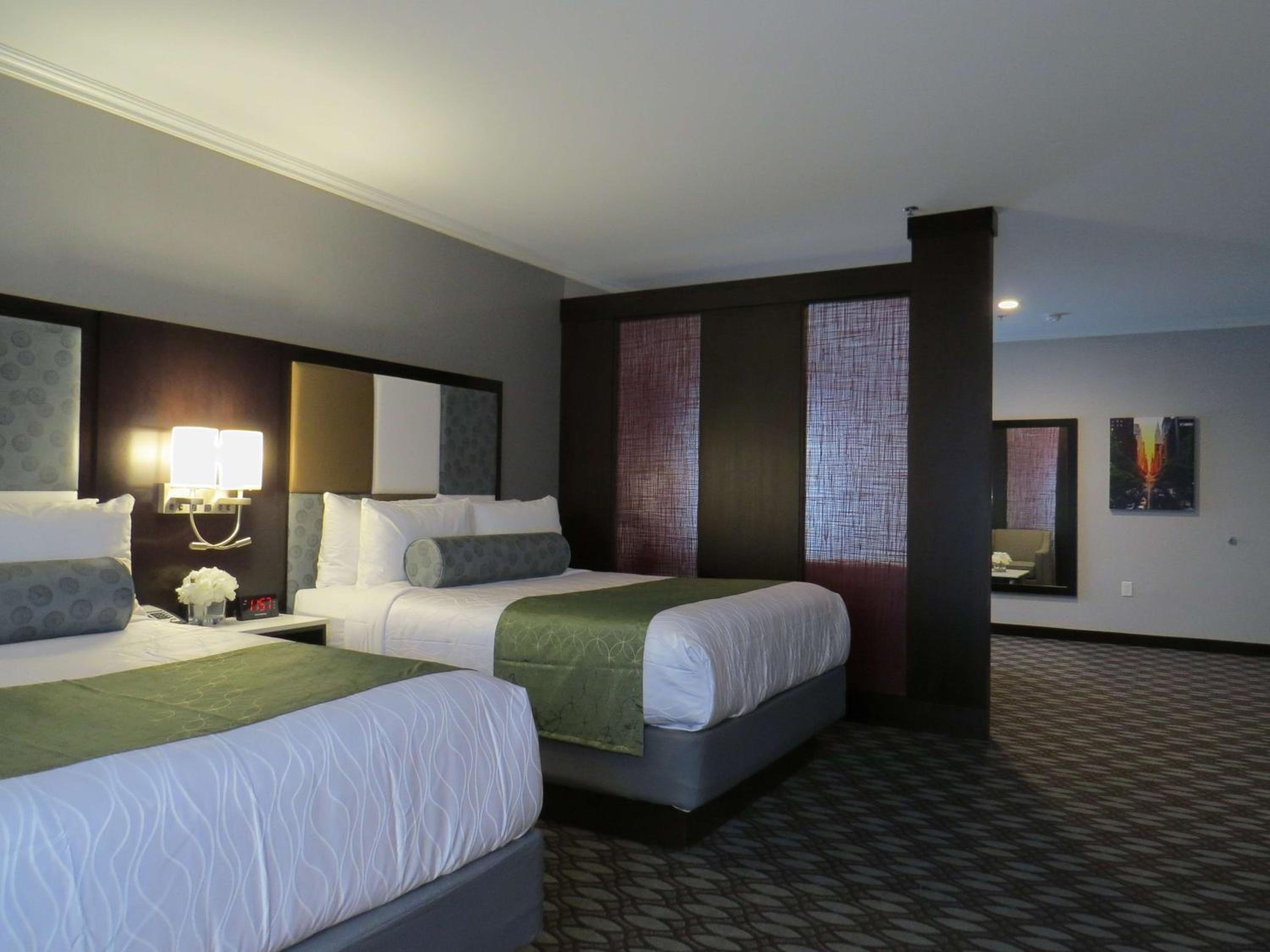 Queen Suite with Two Queen Beds and Sofa Bed