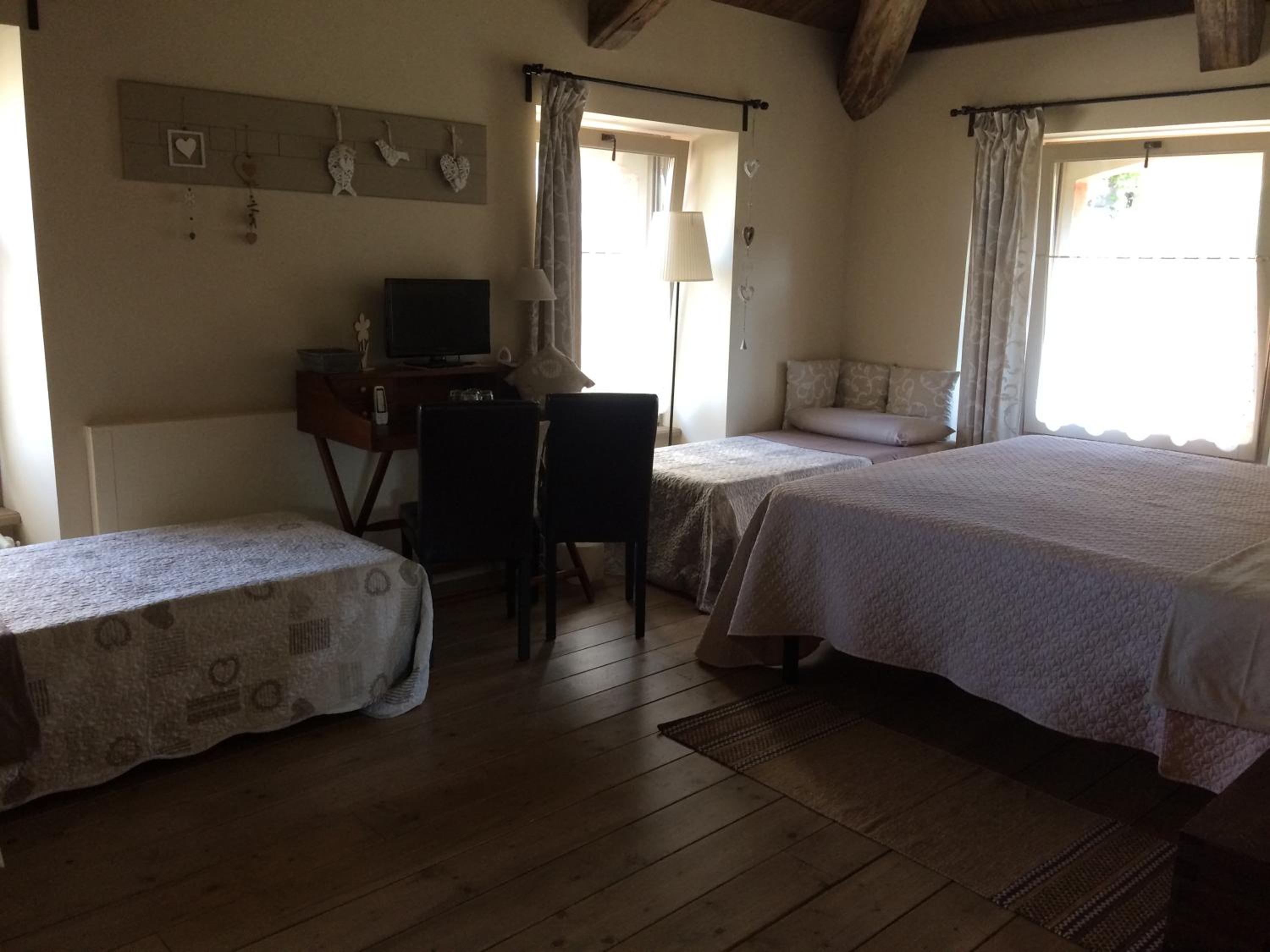 Deluxe Quadruple Room - Photo 1