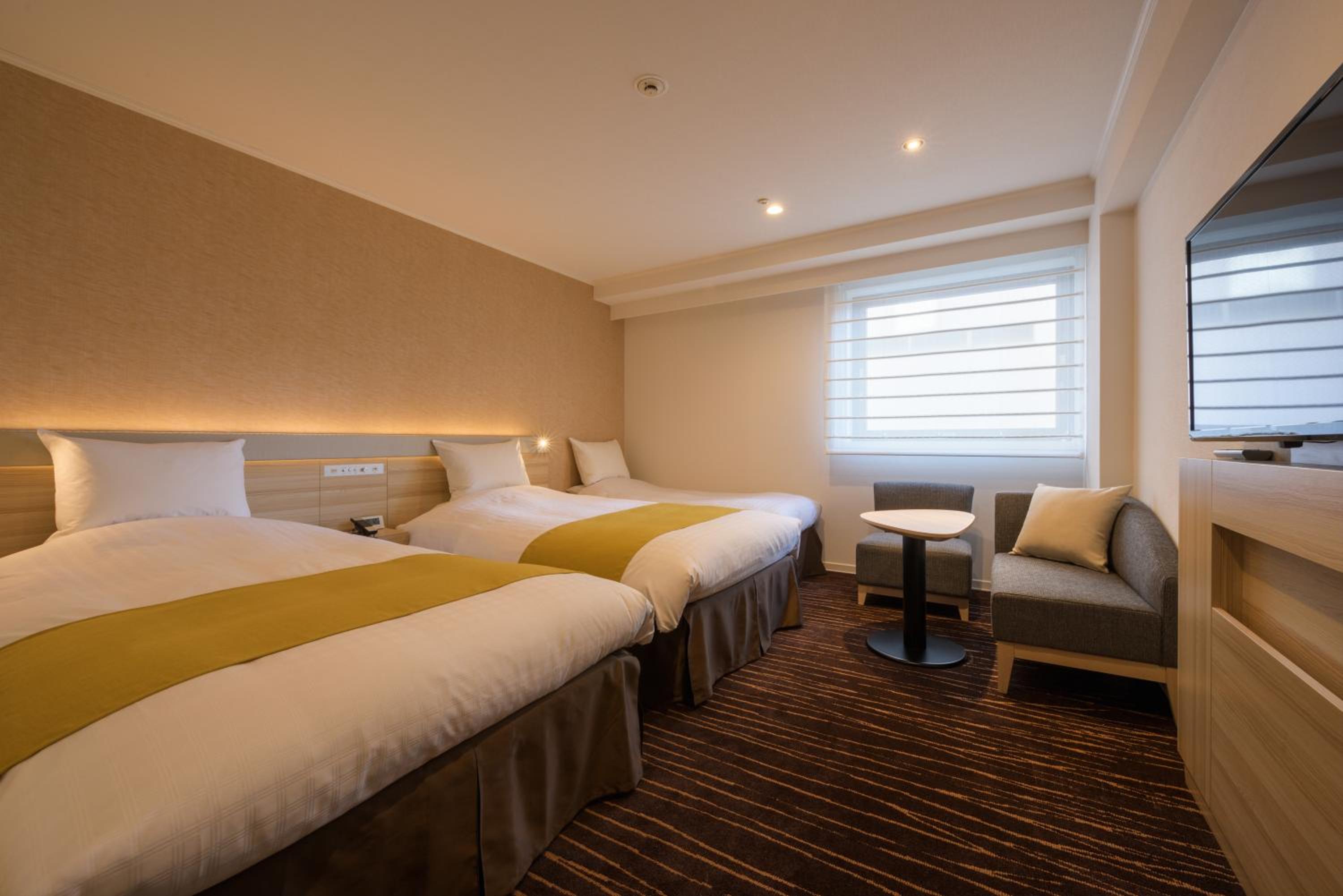 Twin Room with Extra Bed - Smoking - Photo 1