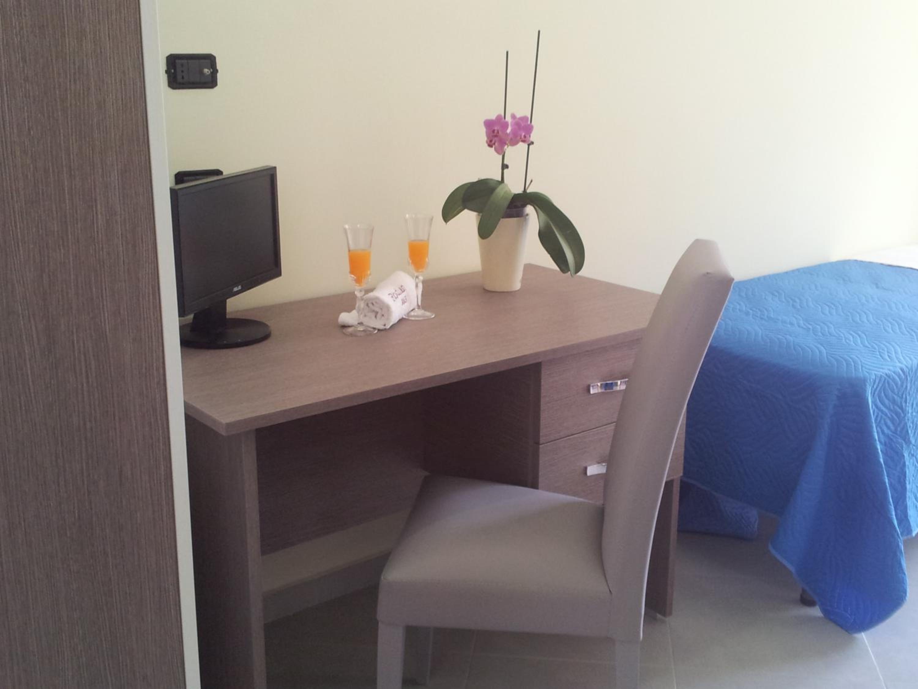 Quadruple Room with Balcony - Photo 1