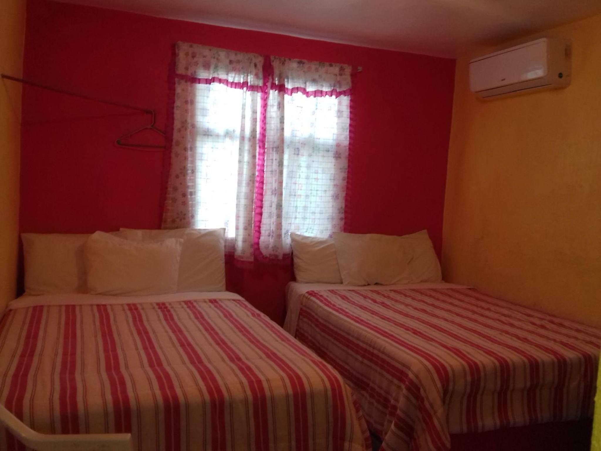 Queen Room with Two Queen Beds - Photo 1