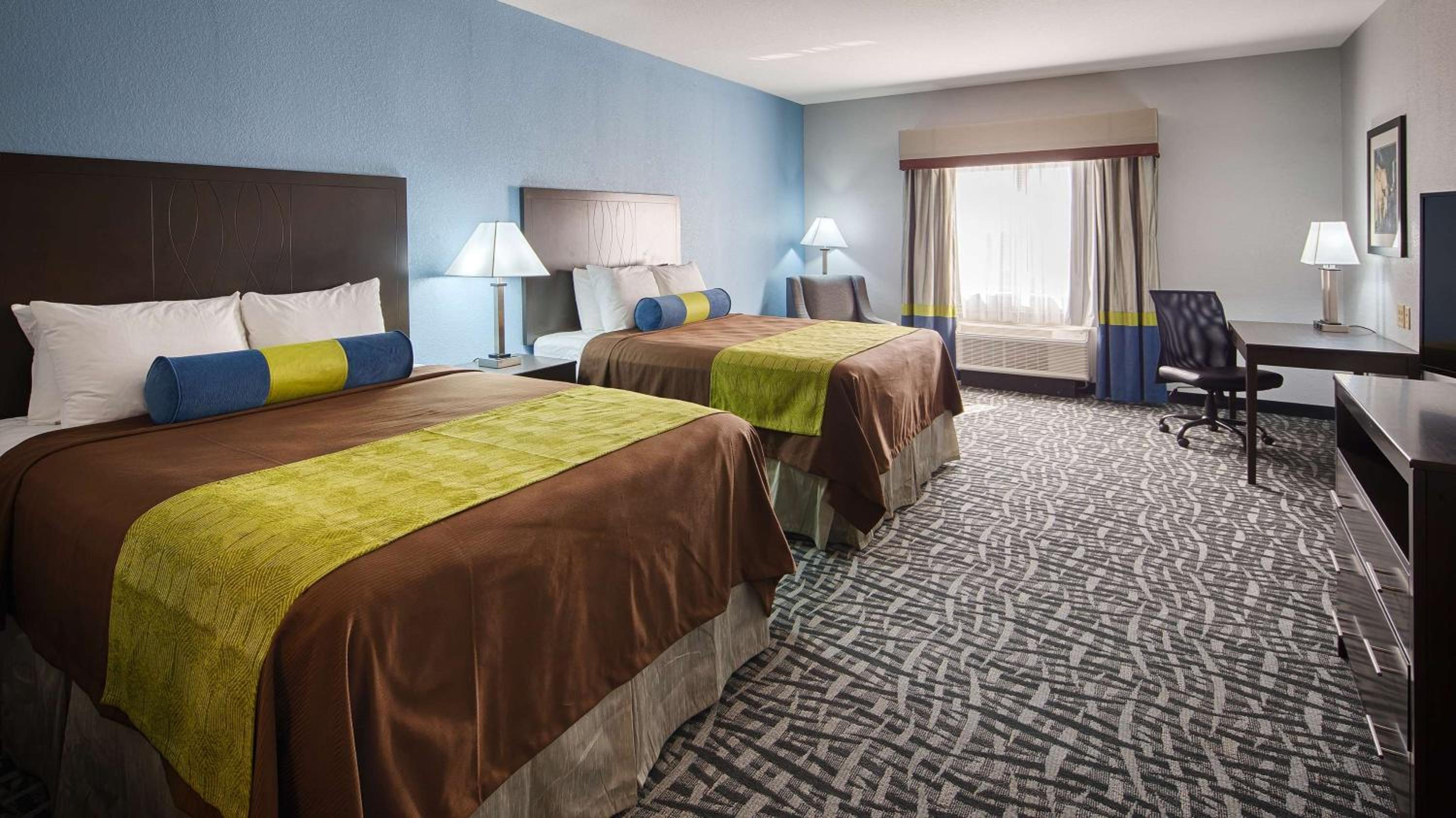 Queen Suite with Two Queen Beds and Sofa Bed photo 1