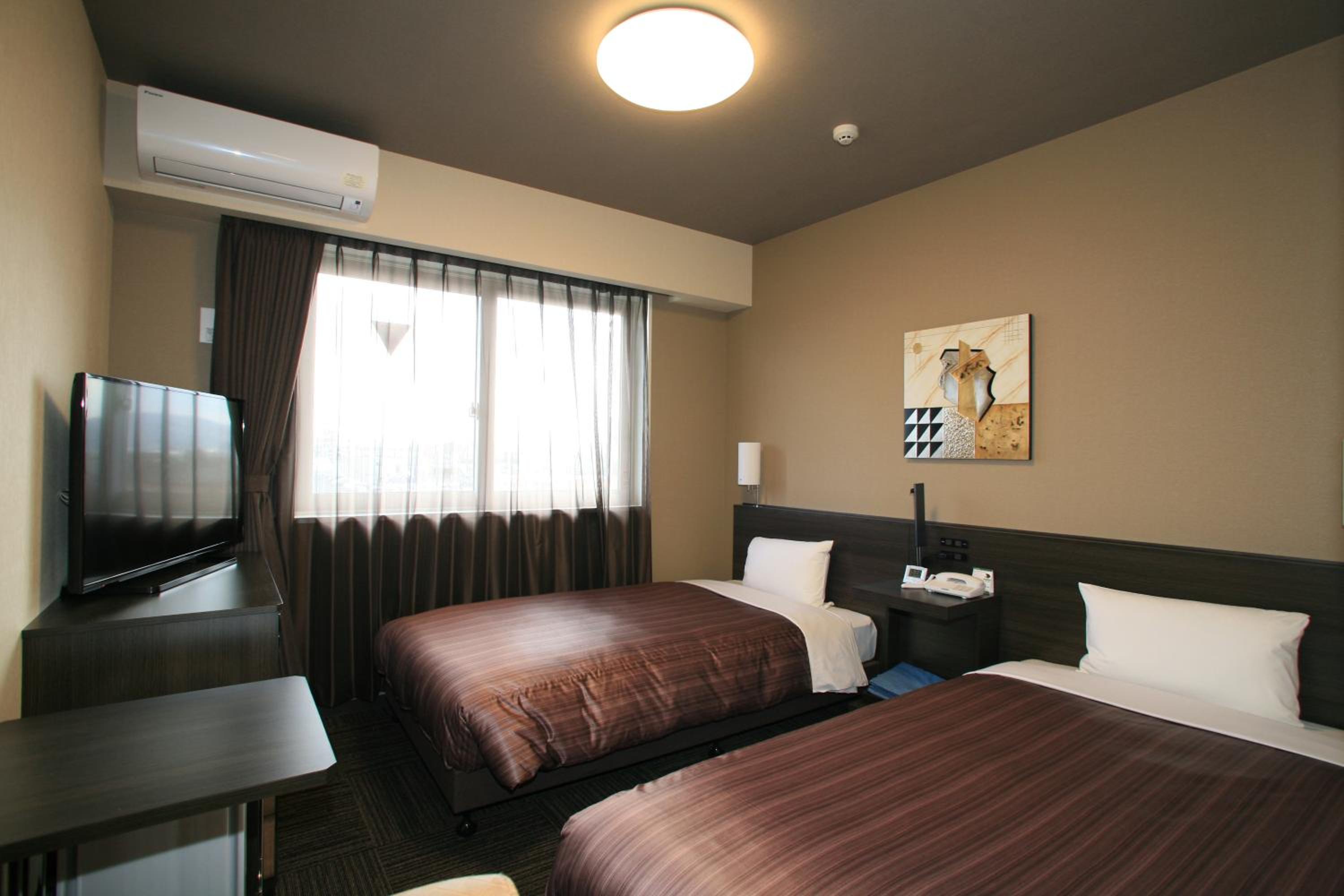 Twin Room - Non-Smoking - Photo 1
