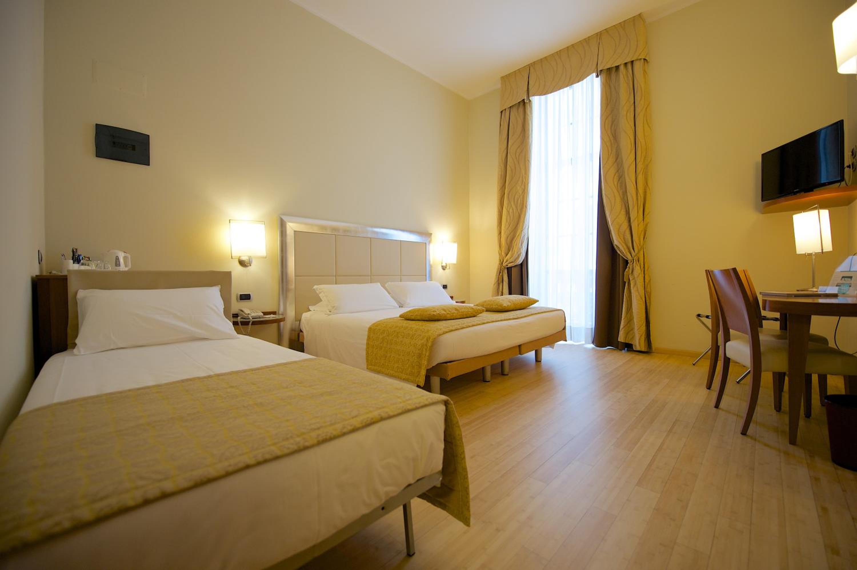 Standard Triple Room with Queen Bed and Single Bed - Photo 14