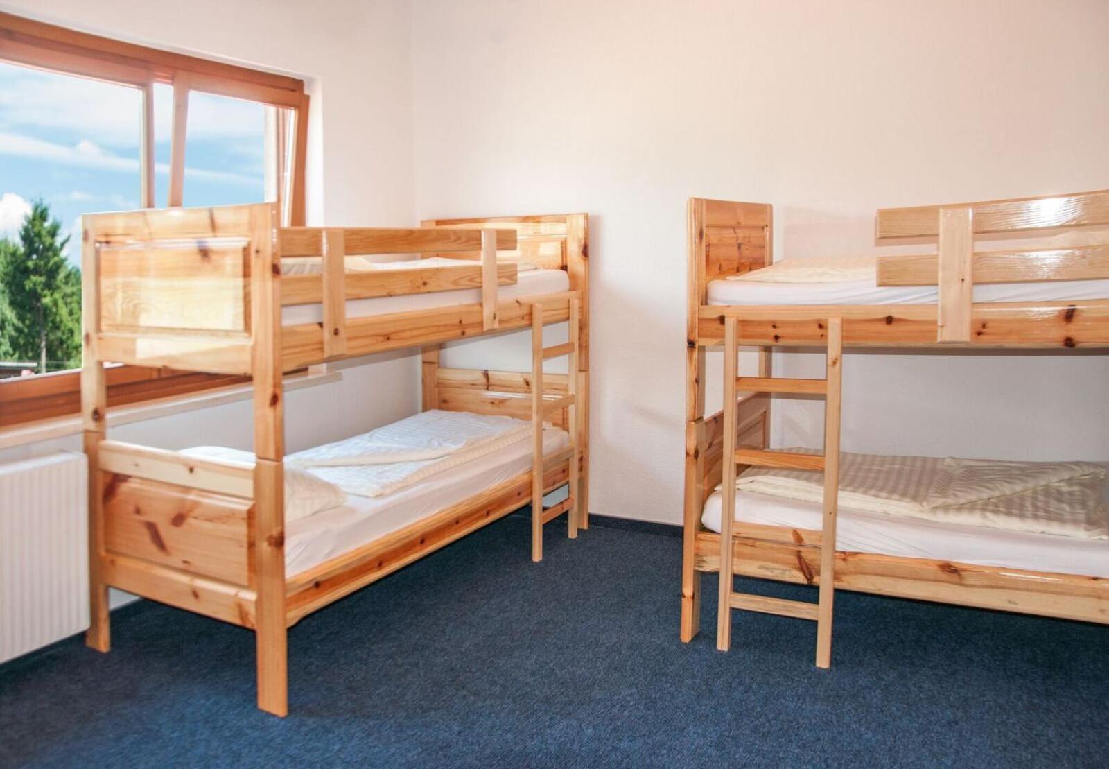 Bed in 8-Bed Dormitory Room with Shared Bathroom photo 1