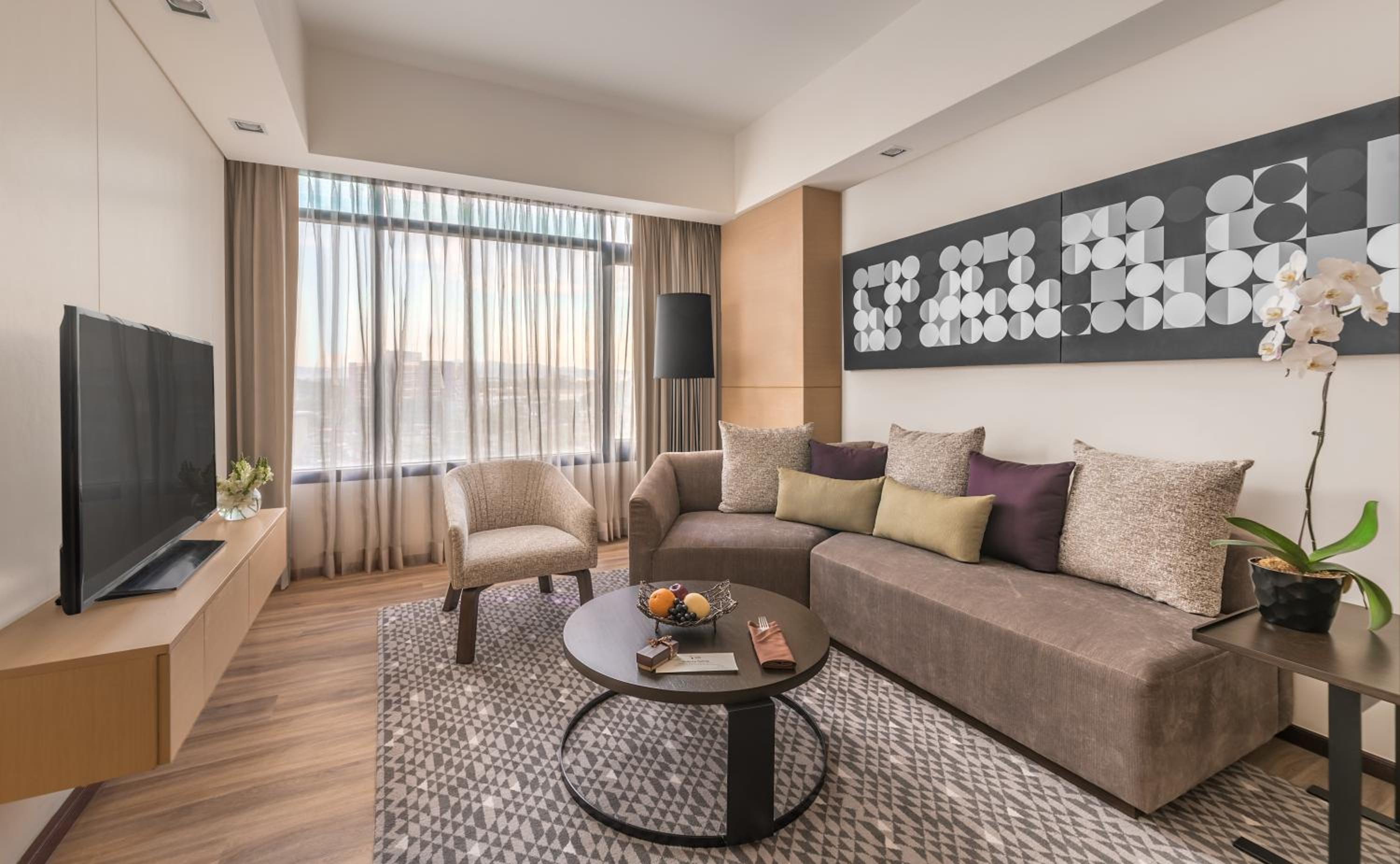 1 King Bed, One-Bedroom Corner Suite with Living Area and Lounge Access