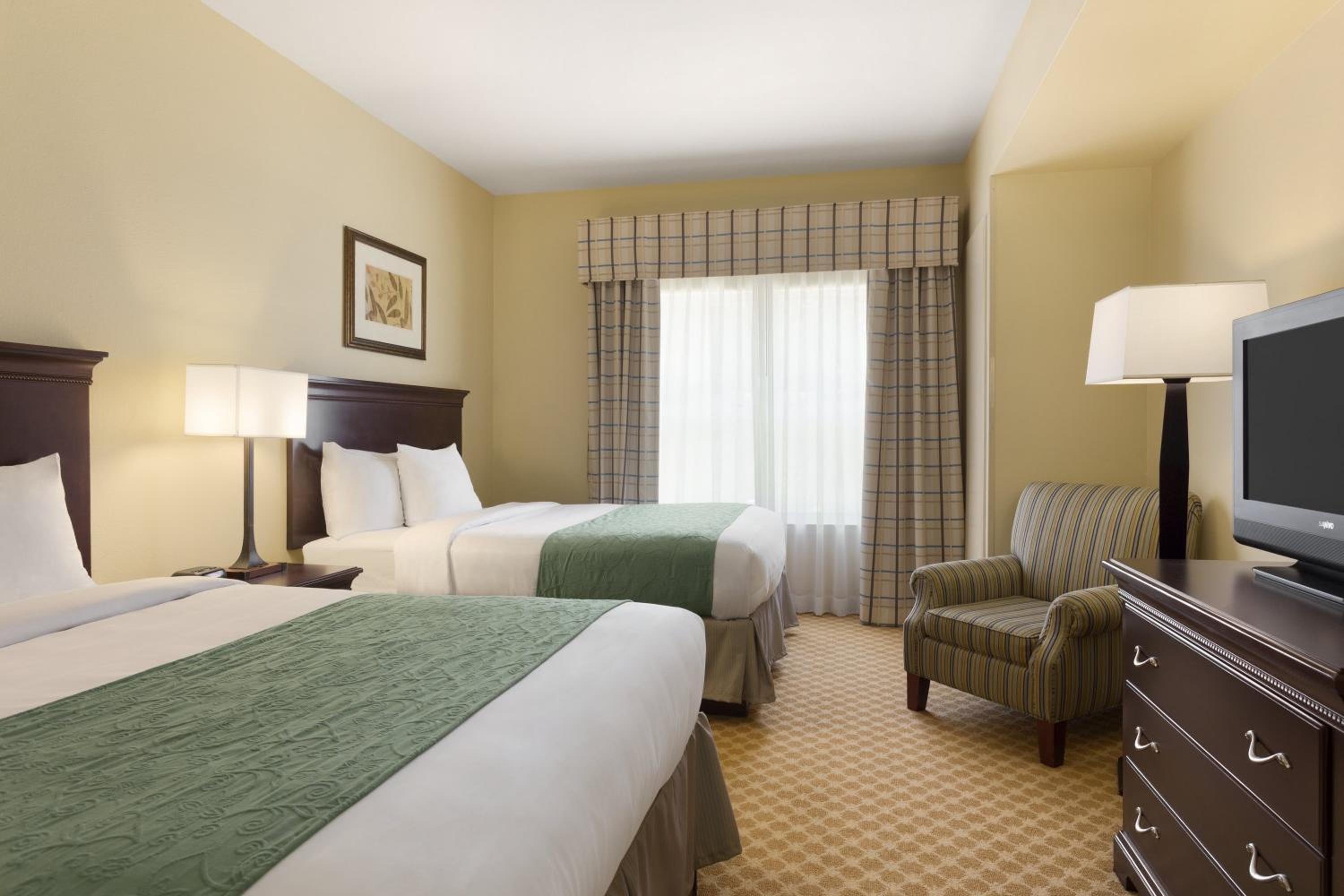 Queen Room with Two Queen Beds - Photo 1