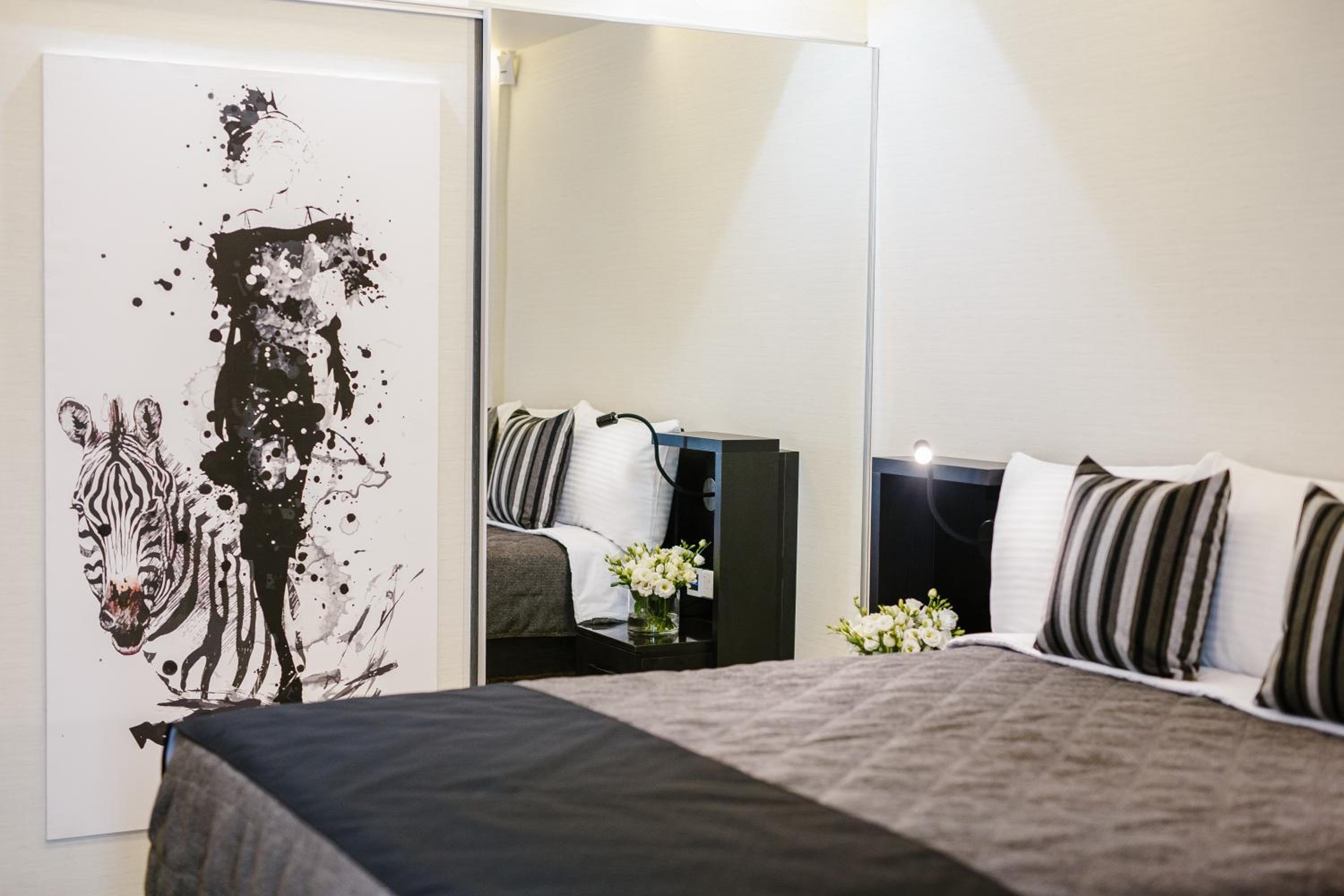 Quarto Individual com Varanda