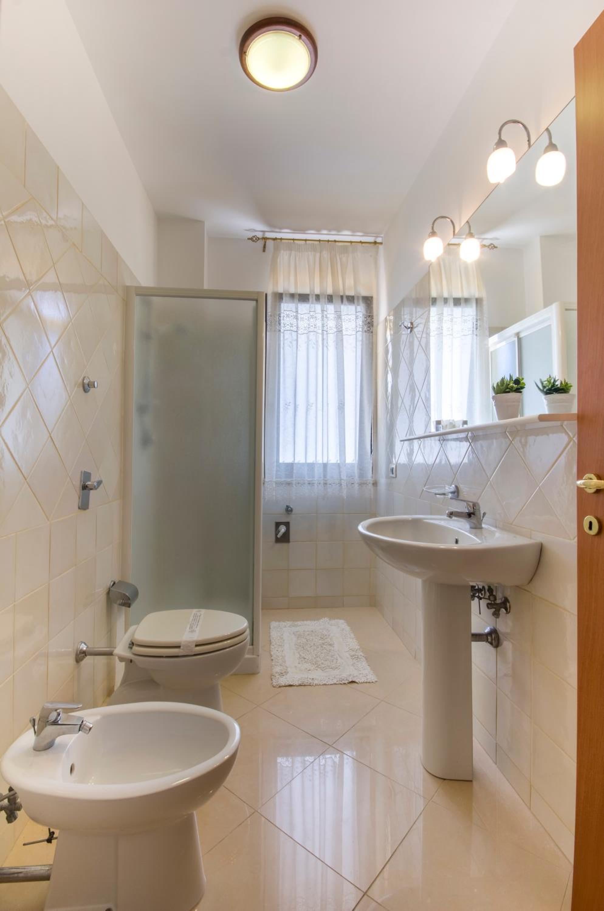 Three-Bedroom Apartment - Photo 2