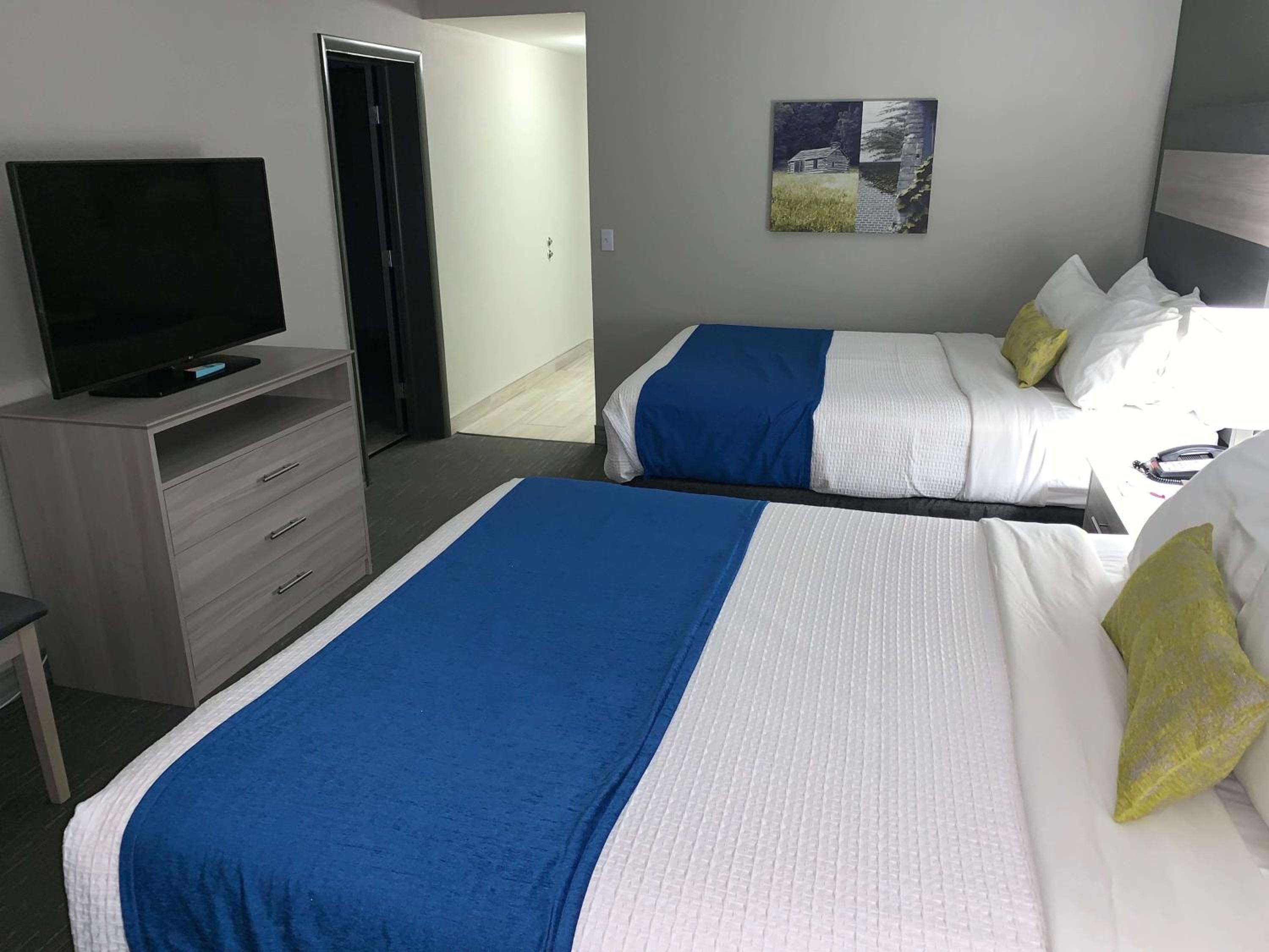 Queen Room with Two Queen Beds and Mobility Accessible Roll-In Shower