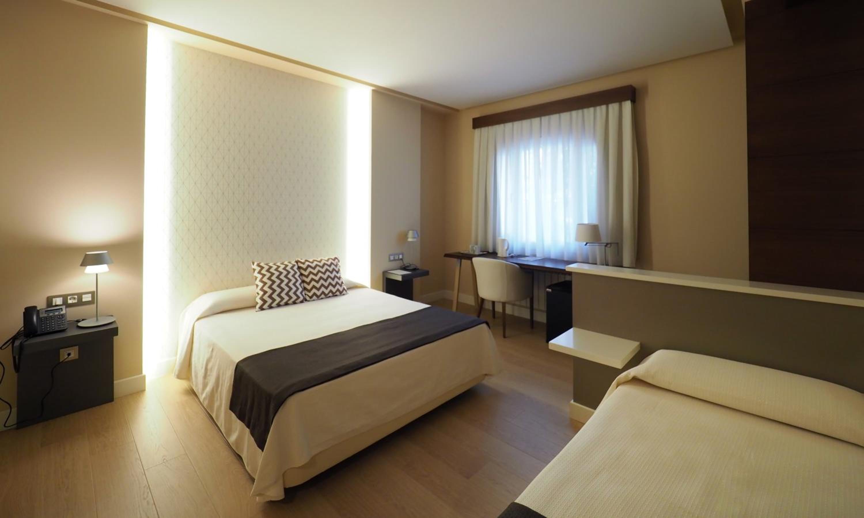 Habitación Triple con Balcón